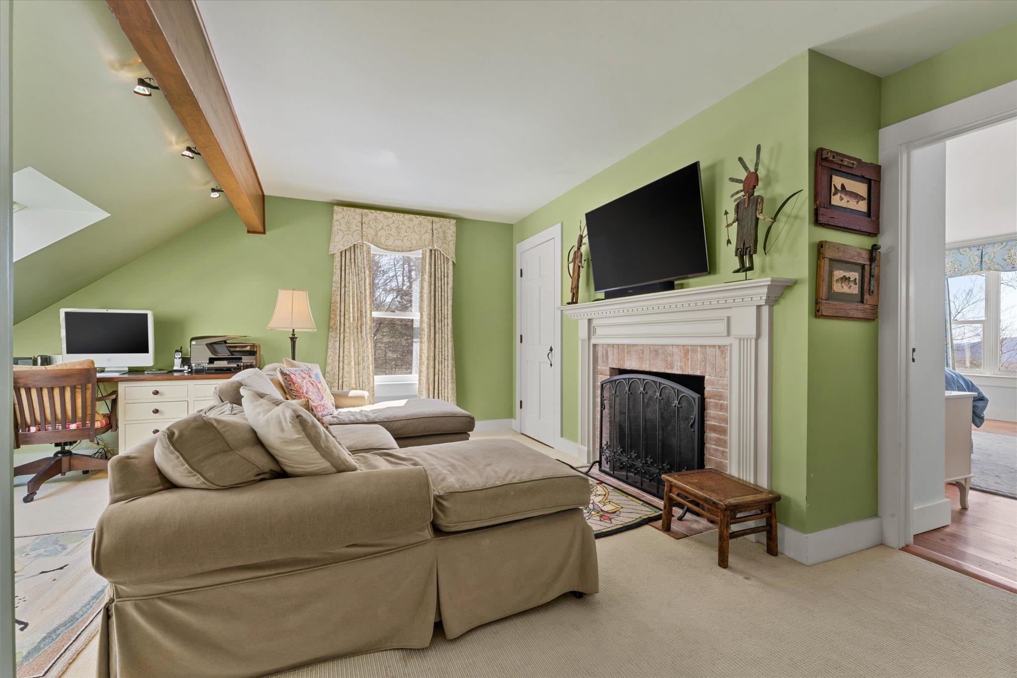 Second floor sitting area with fireplace
