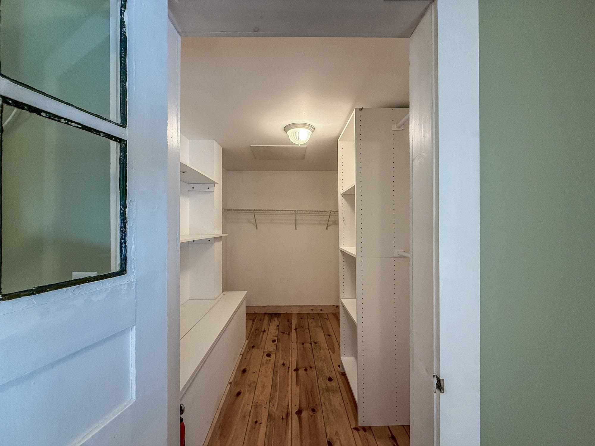 Linen Closet Adjacent to Laundry