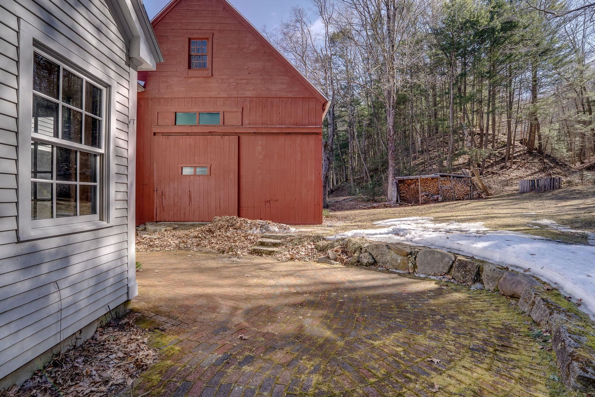 Stone Retaining Wall & Brick Patio