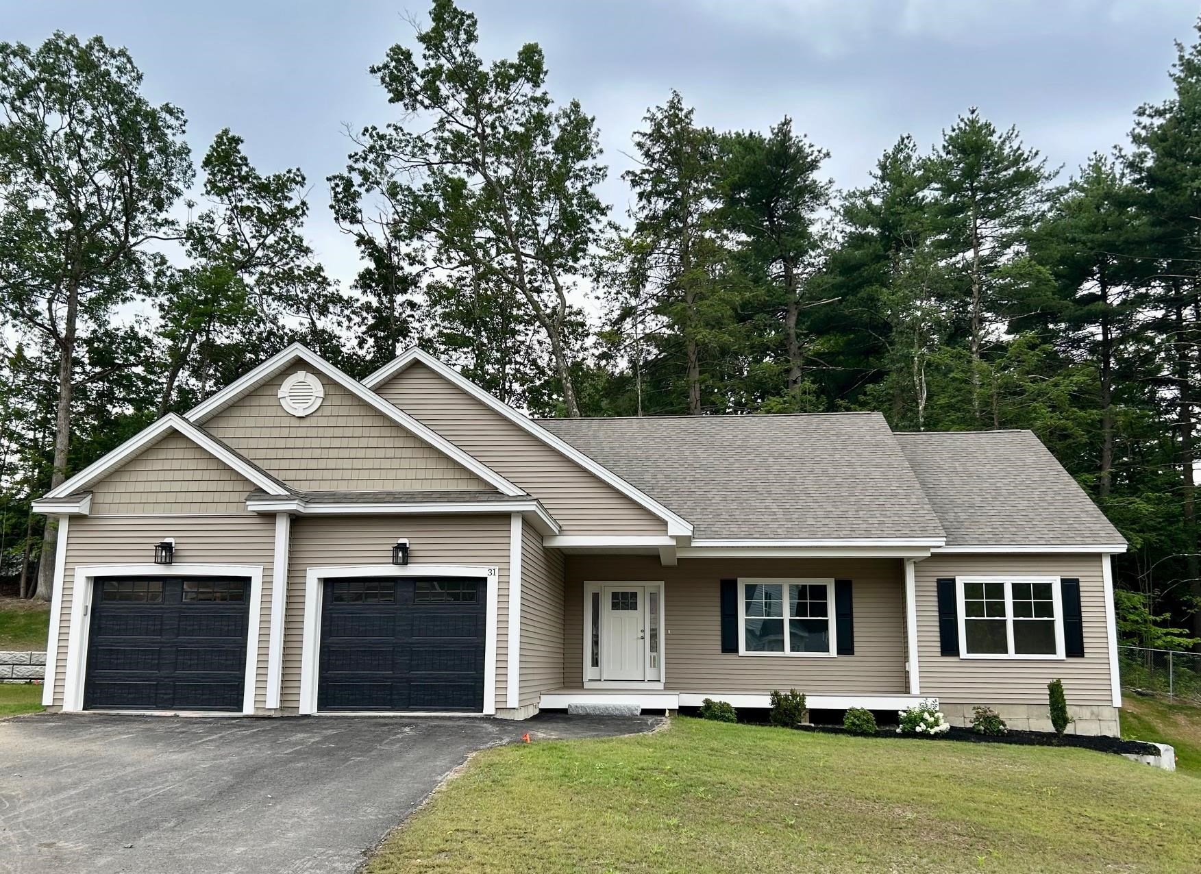 This one has 9' ceiling height on the 1st floor and the basement!!  Fabulous new construction in the heart of Nashua's iconic North End.  This open concept 1848 sq. ft. ranch has everything that you need on one level. The split bedroom layout separates the guest bedrooms from the Primary bedroom suite with wide open space in between for entertaining the kitchen, family room and dining area. Low maintenance living will give you more time to do the things that you like to do.  With Greeley Park as a neighbor you can enjoy the walking trails, picnic areas, summer concerts in the bandshell, tennis, pickleball, softball and even horseshoes!  Downtown is also within walking distance and has everything from chef owned restaurants, sports bars, boutique shopping, a public library and performances at Nashua Center for the Arts. Quick Close Possible!