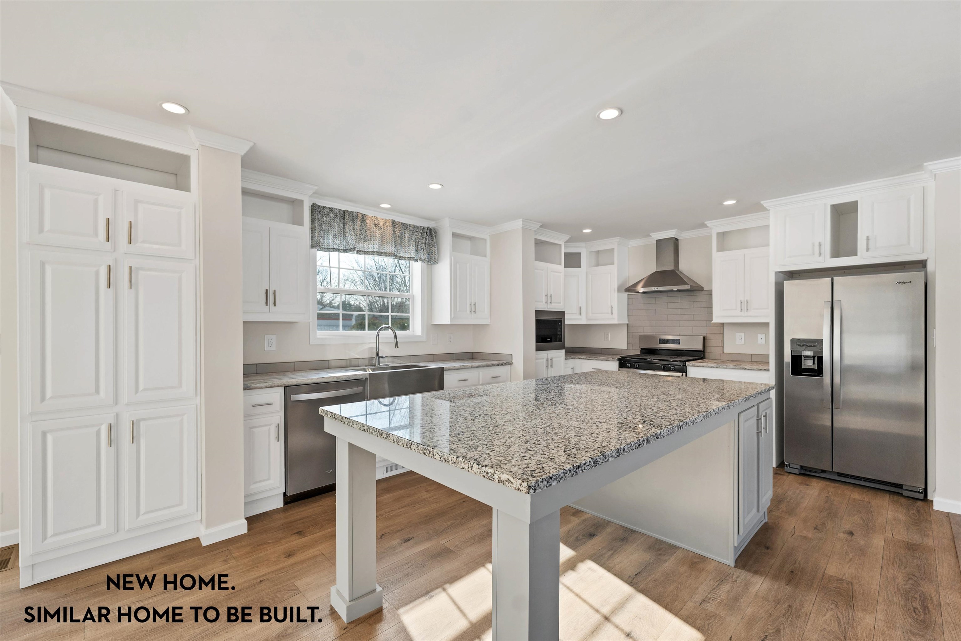 Welcome to your brand-new manufactured home in one of the most established communities along the NH Seacoast. This thoughtfully designed two-bedroom, two-bathroom home includes a versatile bonus room & numerous upgrades. The kitchen is the heart of this home. It features a spacious island w/quartz countertop, stainless-steel  appliances, a Euro-style range hood, full-height backsplash, & a tall satin nickel faucet w/pull-out sprayer. LED recessed lighting & ample storage complete the space, making it a chef’s dream. The great room is ideal for relaxing or entertaining, showcasing a built-in entertainment wall w/a large TV opening, for added warmth & character is an electric fireplace w/customizable flame settings, shelving for books and décor, & rich wood trim accents. The primary bedroom is big enough for a king-size bed, & includes an oversized closet w/charming double barn door entry, blending practicality w/rustic style. There is a luxurious bathroom includes a 4’x6’ spa shower w/acrylic surround, rainforest showerhead, clear glass door, & chrome roller track. A large vanity with LED lighted mirrors, porcelain vessel sinks, & brushed nickel faucets. Laundry day is a breeze with a spacious area that makes washing & folding effortless. You'll also love the second bedroom & bonus room offer plenty of space for guests, hobbies, a home office, or whatever you need. You are close to all shopping & commuting needs. Home anticipated to be move-in ready by June 2025. Welcome home!