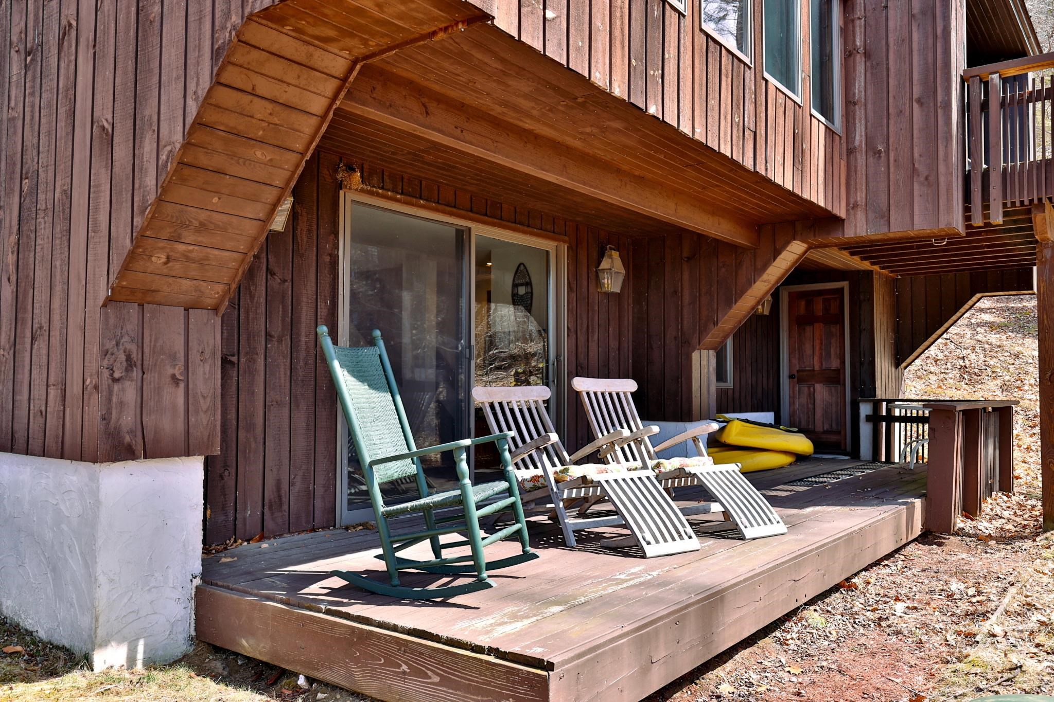 Lower level deck with storage room at end