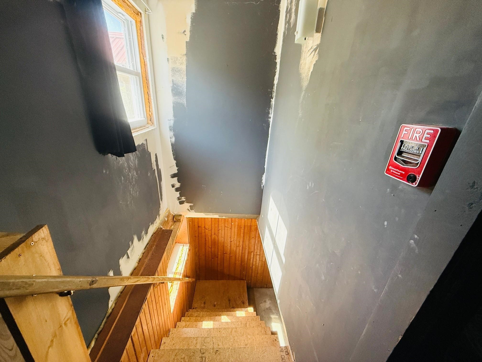 Stairs to basement from entry room