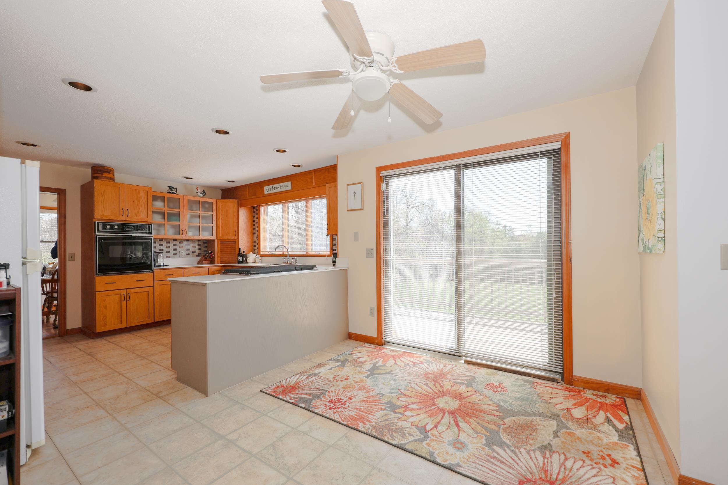 Sliding glass doors off kitchen to back deck