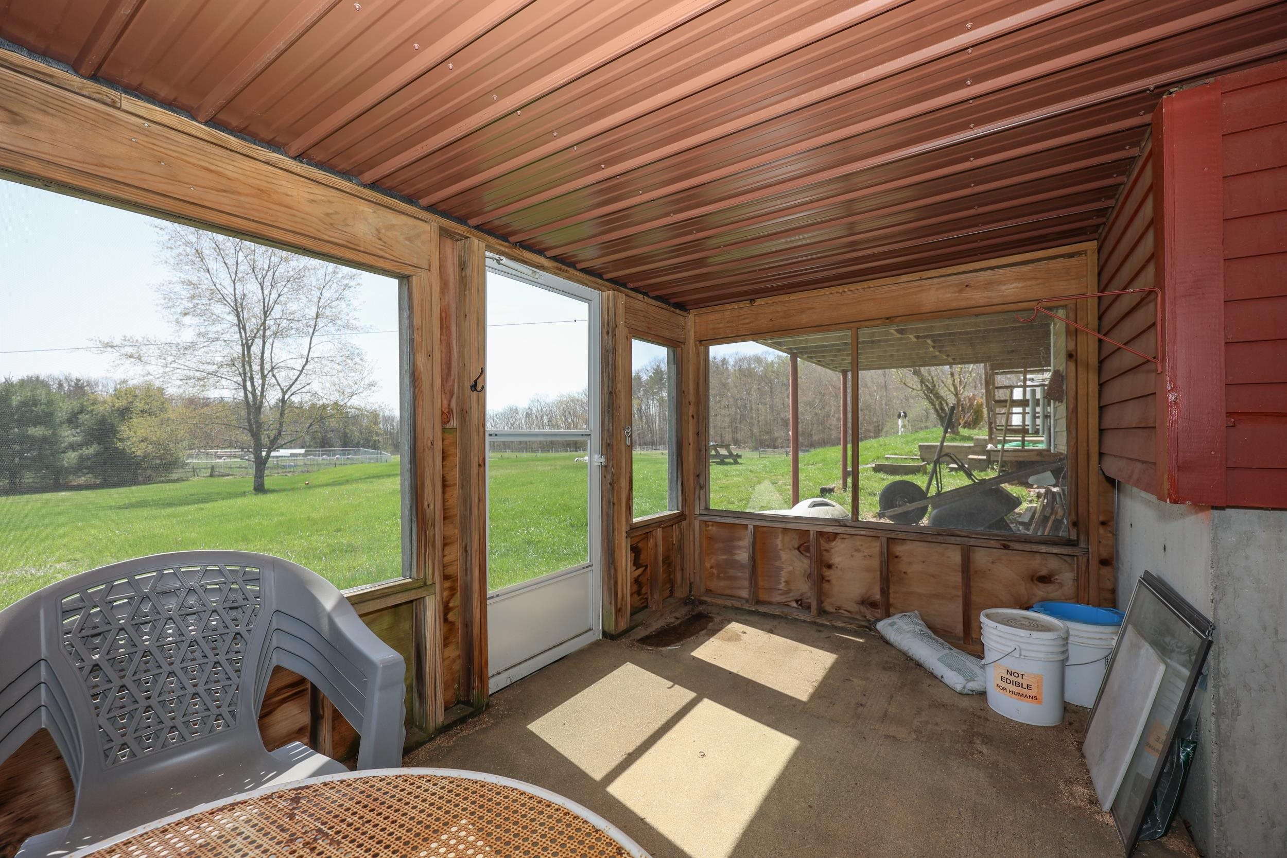 Screened porch off basement and under deck