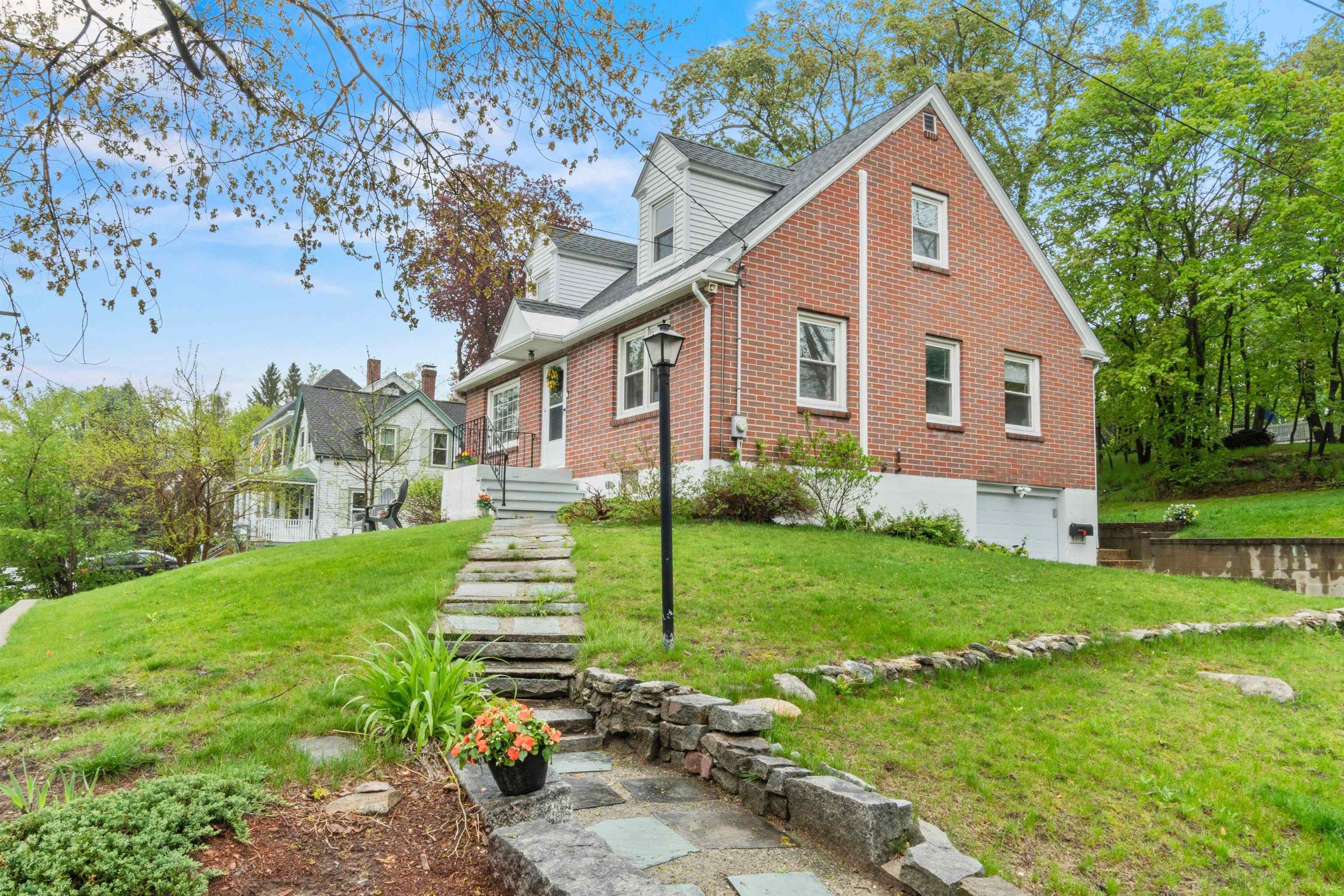 Charming granite stairway to the front door. 23152188