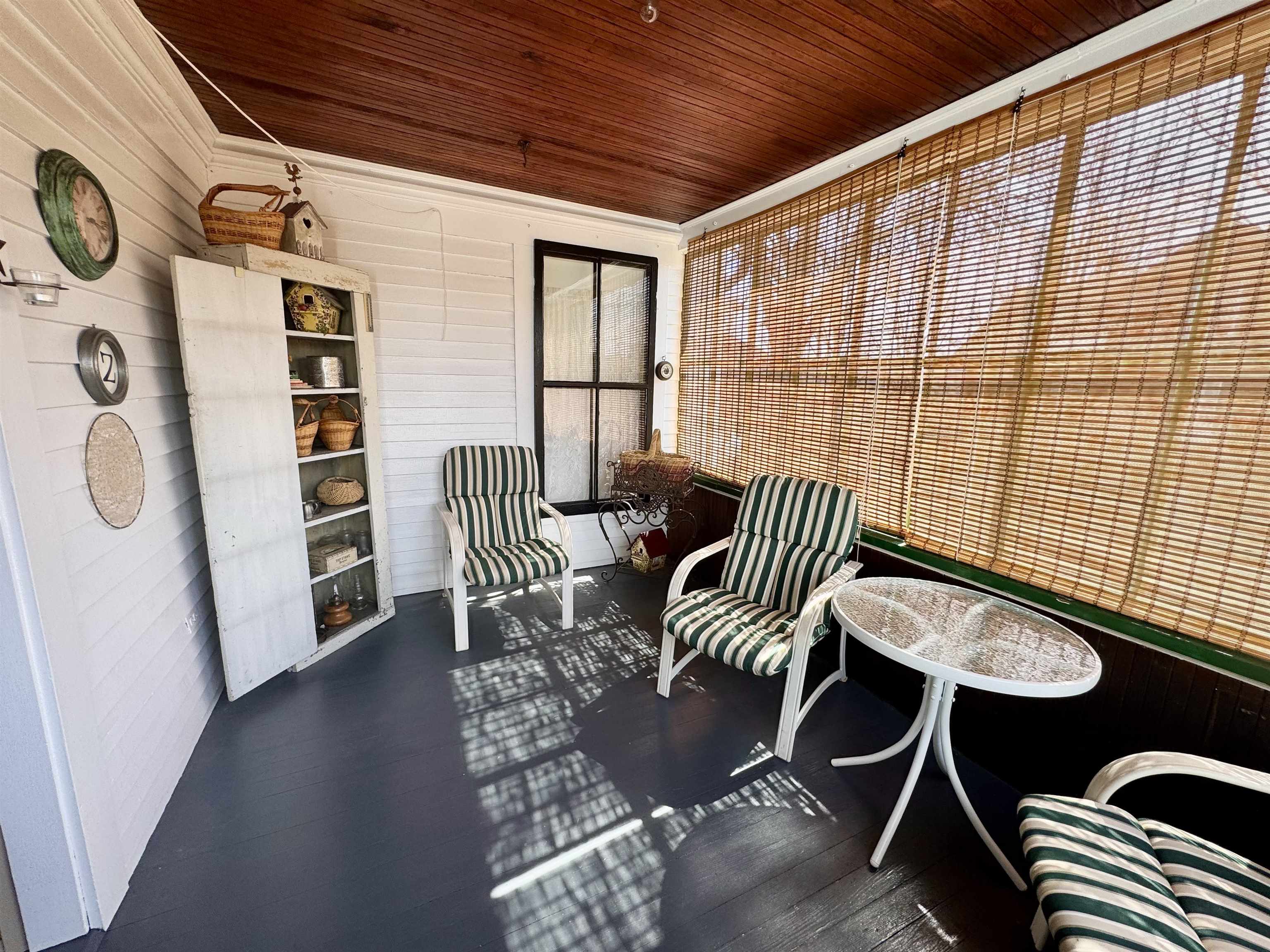 Enclosed three season porch on second floor 22954063