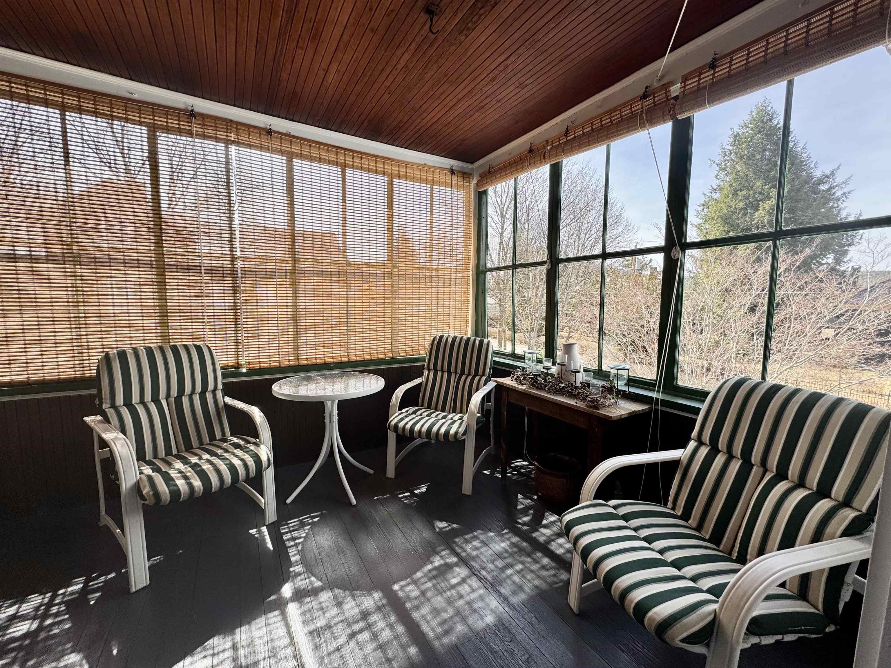 Enclosed three season porch on second floor 22954062