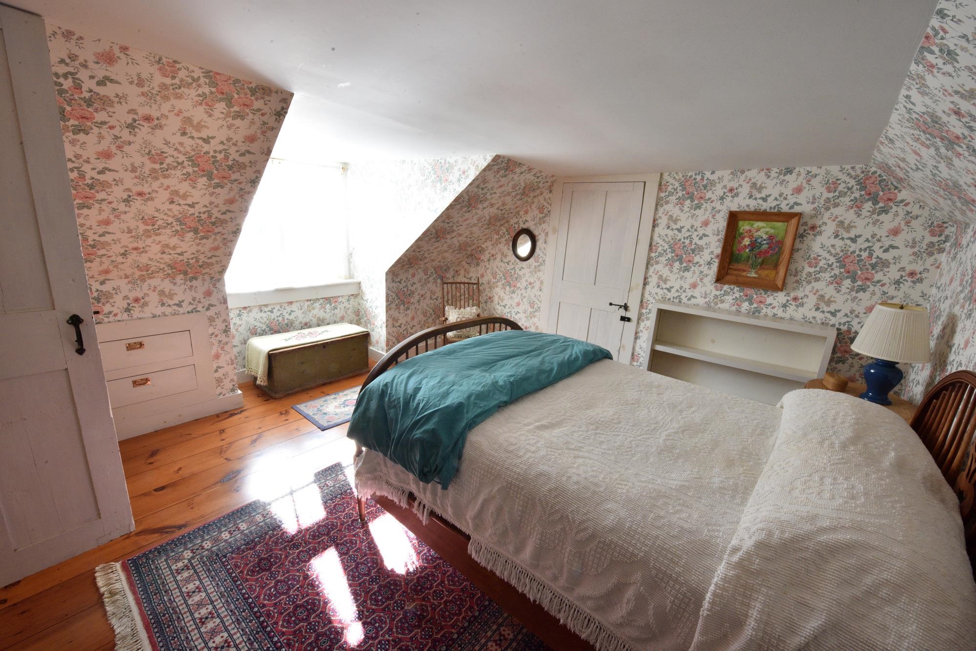 One of two second floor bedrooms 23164658