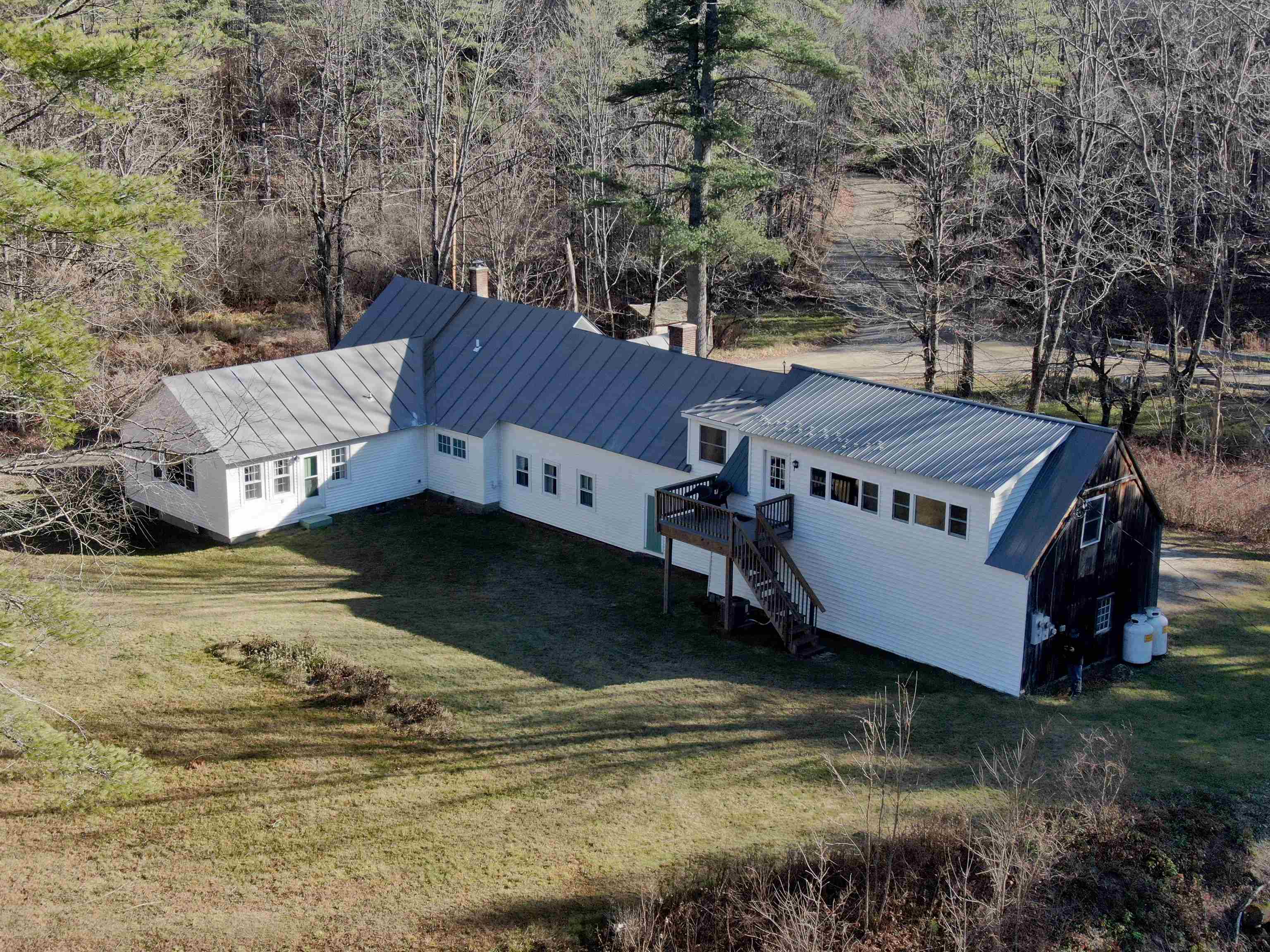 Family room to the left and studio over the barn on right 23164636