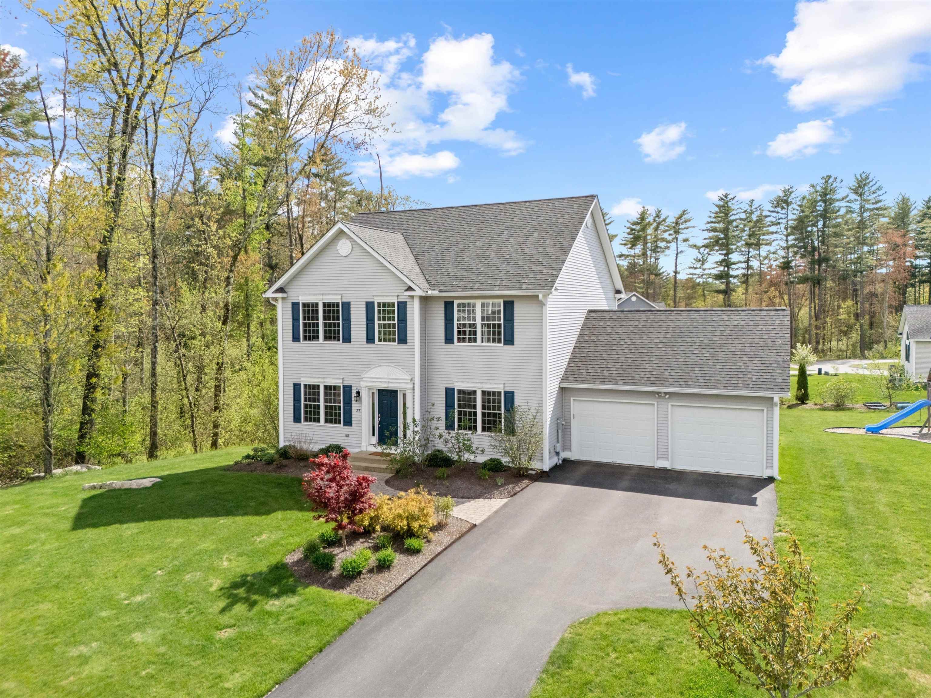Welcome to Mill Pond, a desirable North Londonderry neighborhood where community and convenience meet. Just minutes from Exit 5 and Manchester-Boston Regional Airport, this beautifully maintained home is designed for everyday comfort and effortless entertaining. Natural light fills the open-concept layout, featuring hardwood floors, a cozy gas fireplace, and a chef-inspired kitchen with granite counters, stainless steel appliances, and subway tile backsplash. Upstairs, a sunny loft offers space to work or unwind, and the primary suite includes a walk-in closet and double vanity. But the true highlight is the backyard—your private escape. Start your mornings under the pergola on the 20x16 composite deck, spend summer days by the crystal-clear pool, relax in the hot tub under the stars, or gather on the expansive stone patio. With manicured landscaping, a swing set, storage shed, tankless hot water, central air, and high-efficiency systems, this home is where lifestyle lives. Be sure to check out the 3D Matterport tour for a full walkthrough experience before your showing. Showings start at the open house Fri, May 16th 4:30-6pm. Followed by additional open house on Sat, May 17th & Sun, May 18th 10:30-12pm.