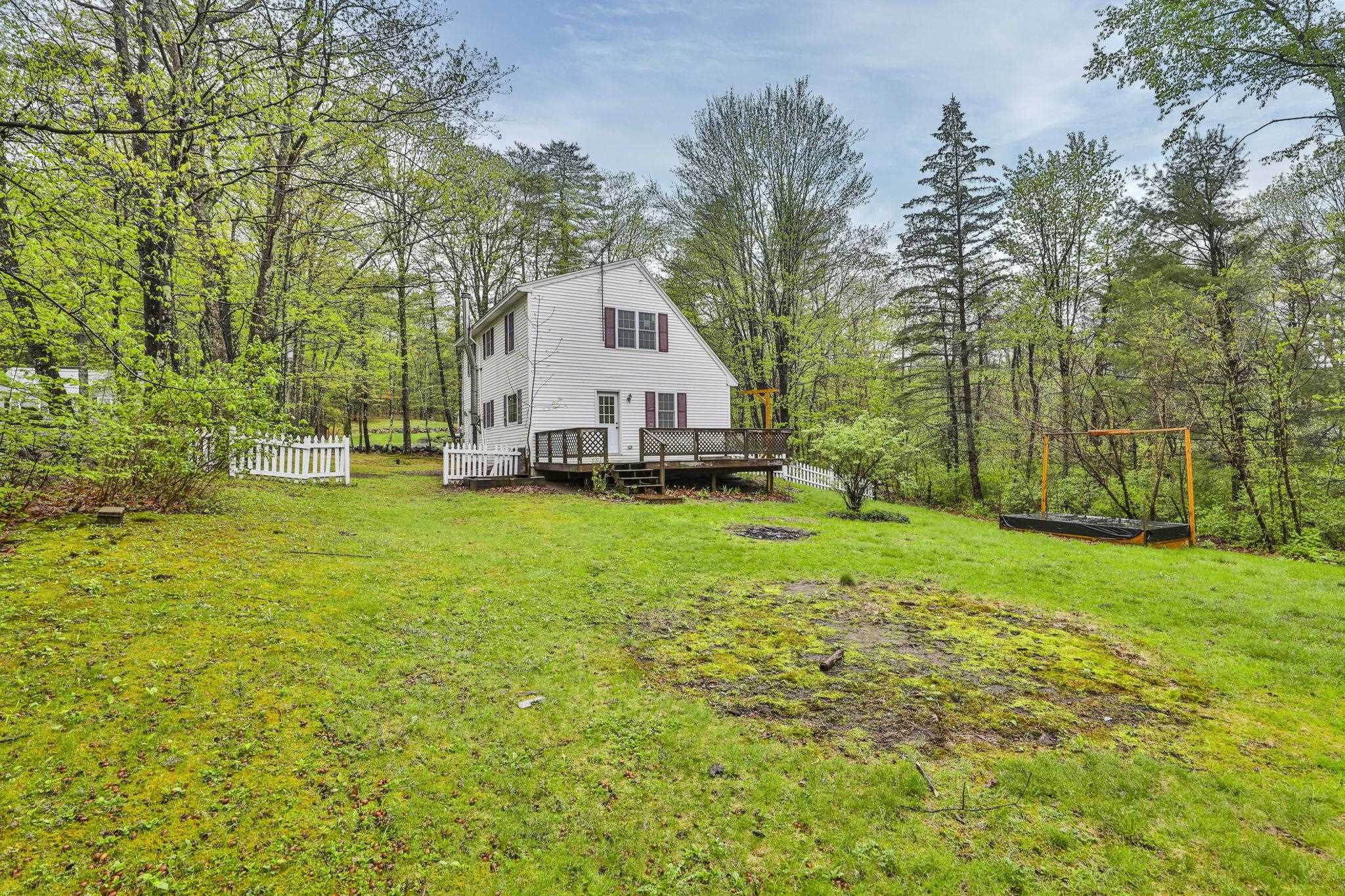 Large side yard with 12 x 24 deck