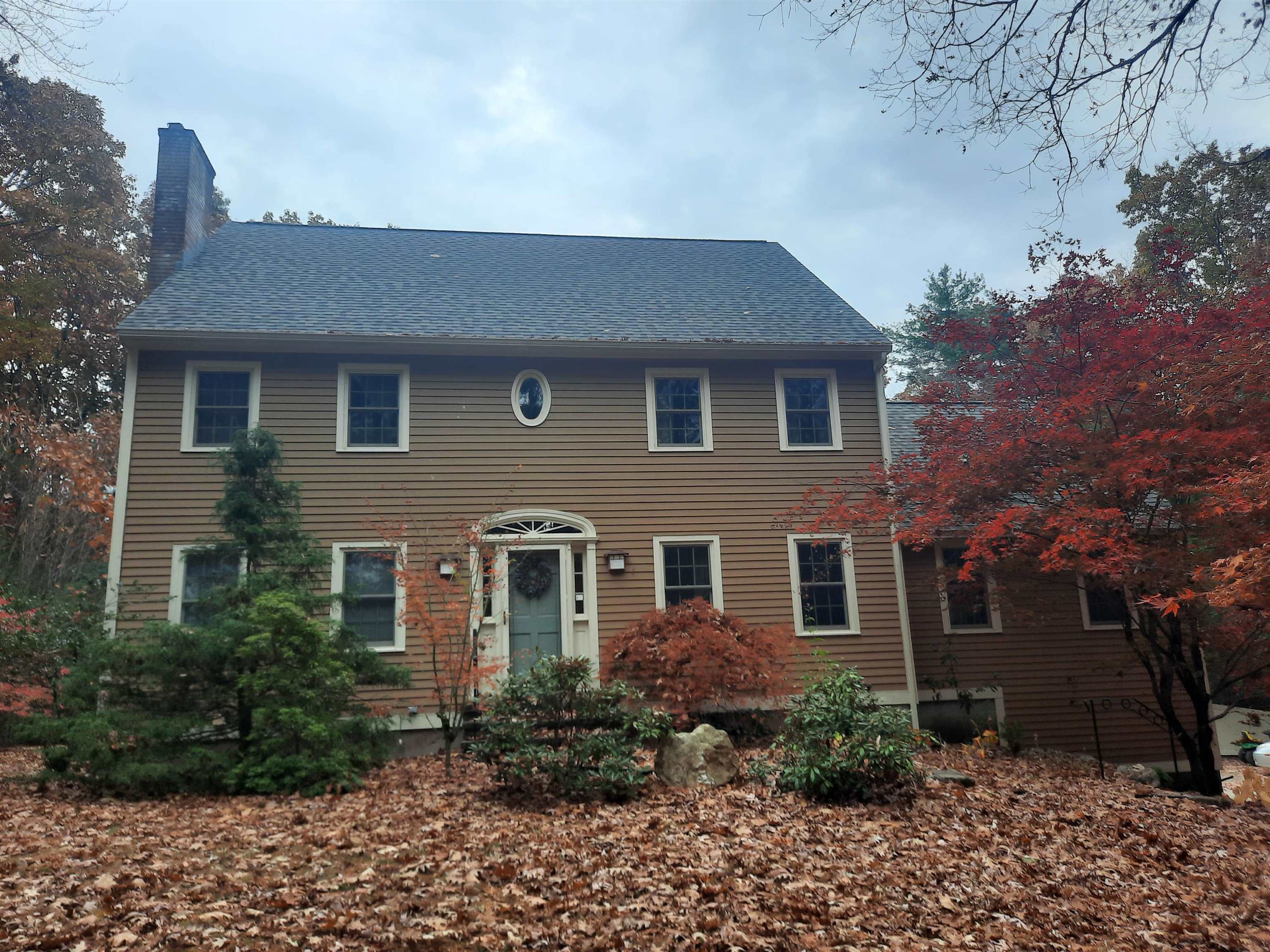 Custom built Colonial set back from road on 4 acres with spring fed pond with electric waterfall available for the first time by original owners. 3 Working fireplaces, one with propane gas fixture. Efficient oil furnace 3 years new, can be converted to gas. Stand alone whole house generator. Central a/c 2 1/2 years new and vacuum with filter. Primary bedroom upstairs with vaulted ceiling, hardwood floors, wood fireplace, bath with deep soaking tub, walk in shower, heated floor and electric towel warmer. Another full bathroom down the hall and 2 more bedrooms. There is also a 1/2 bath with washer and dryer space. Great room with vaulted ceiling, hardwood floors, gas fireplace and ceiling fan. Under the great room is a 2 car garage with openers. Solid redwood ceiling in kitchen and black sky granite counters. Stainless appliances including double wall ovens. All rooms are wired for cable and phone. Over 100 varieties of daylilies, 3 miniature maple trees, 2 weeping Norwegian pine trees, 3 Shag Bark Hickory Trees, 1 Dogwood, 5 Kousa Japanese Dogwood Trees, 2 varieties of lilies of the valley, 5 R rose bushes, over 30 assorted varieties of rhododendron and small herb garden with mostly sage and garlic. Electric from street is underground. 50 year roof added 9 months ago. More pictures will be added soon.