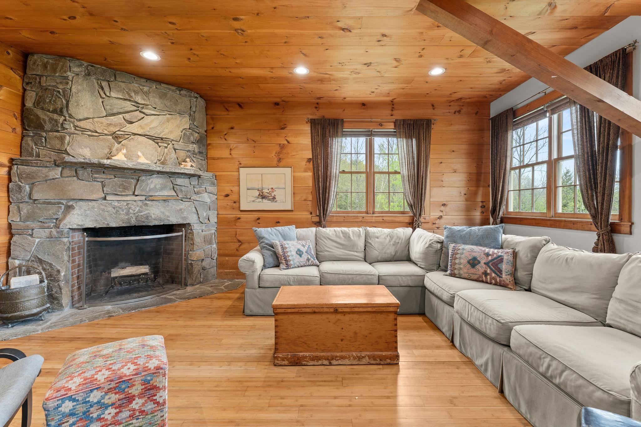 Living Room w/ Natural Stone Fireplace 23187907
