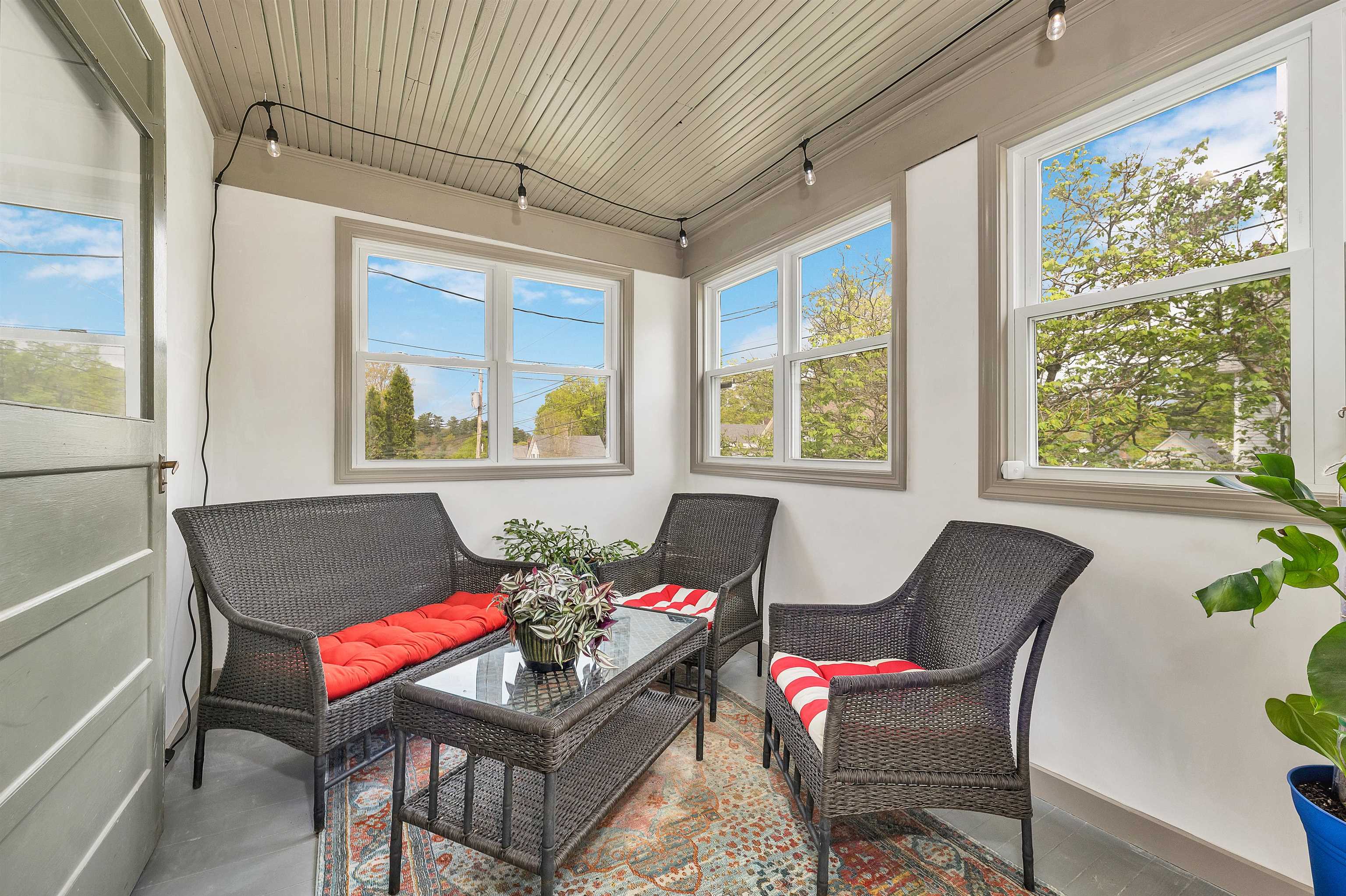 Enjoy coffee on your enclosed porch 23169333