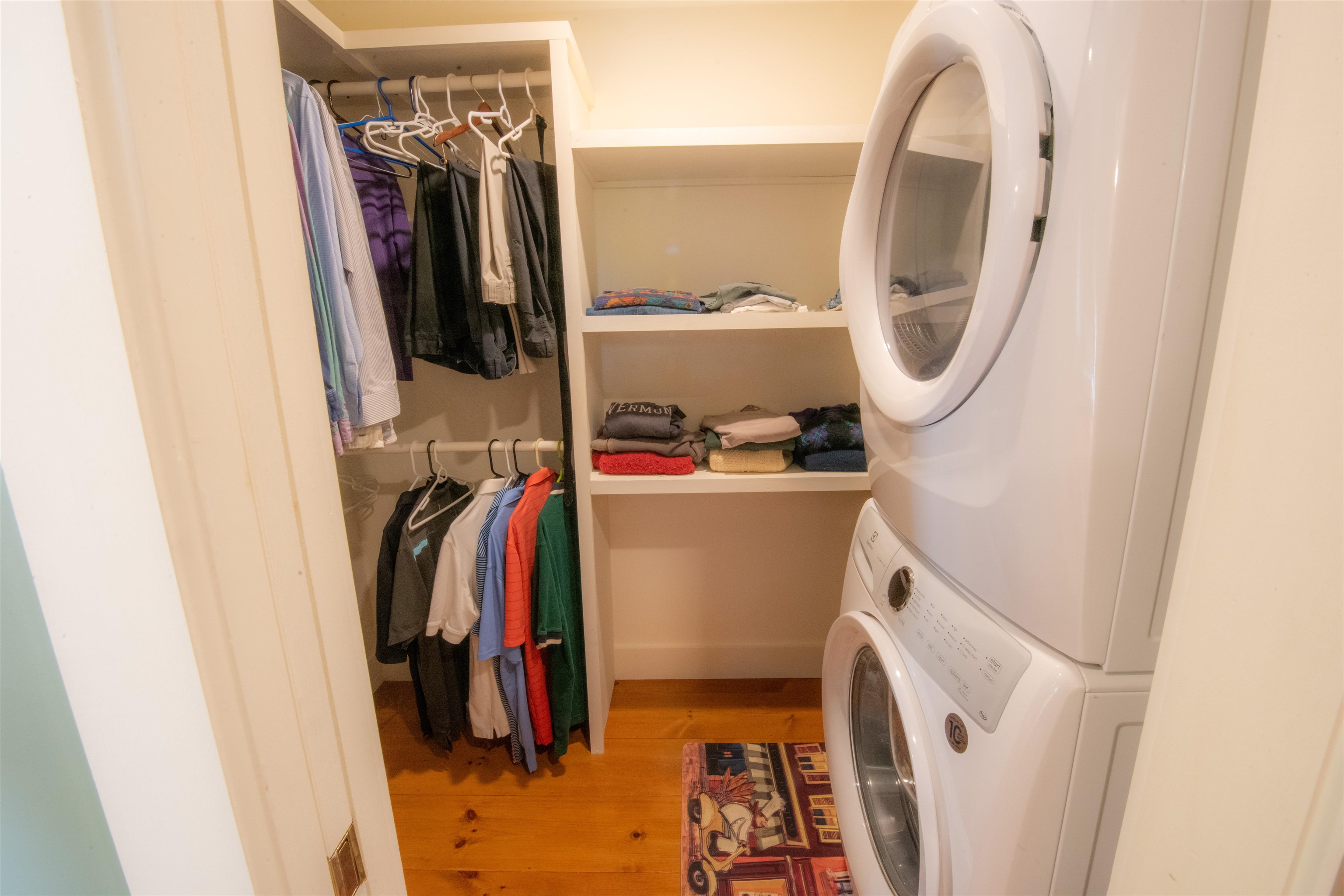 Small walkin closet and laundry 23218437