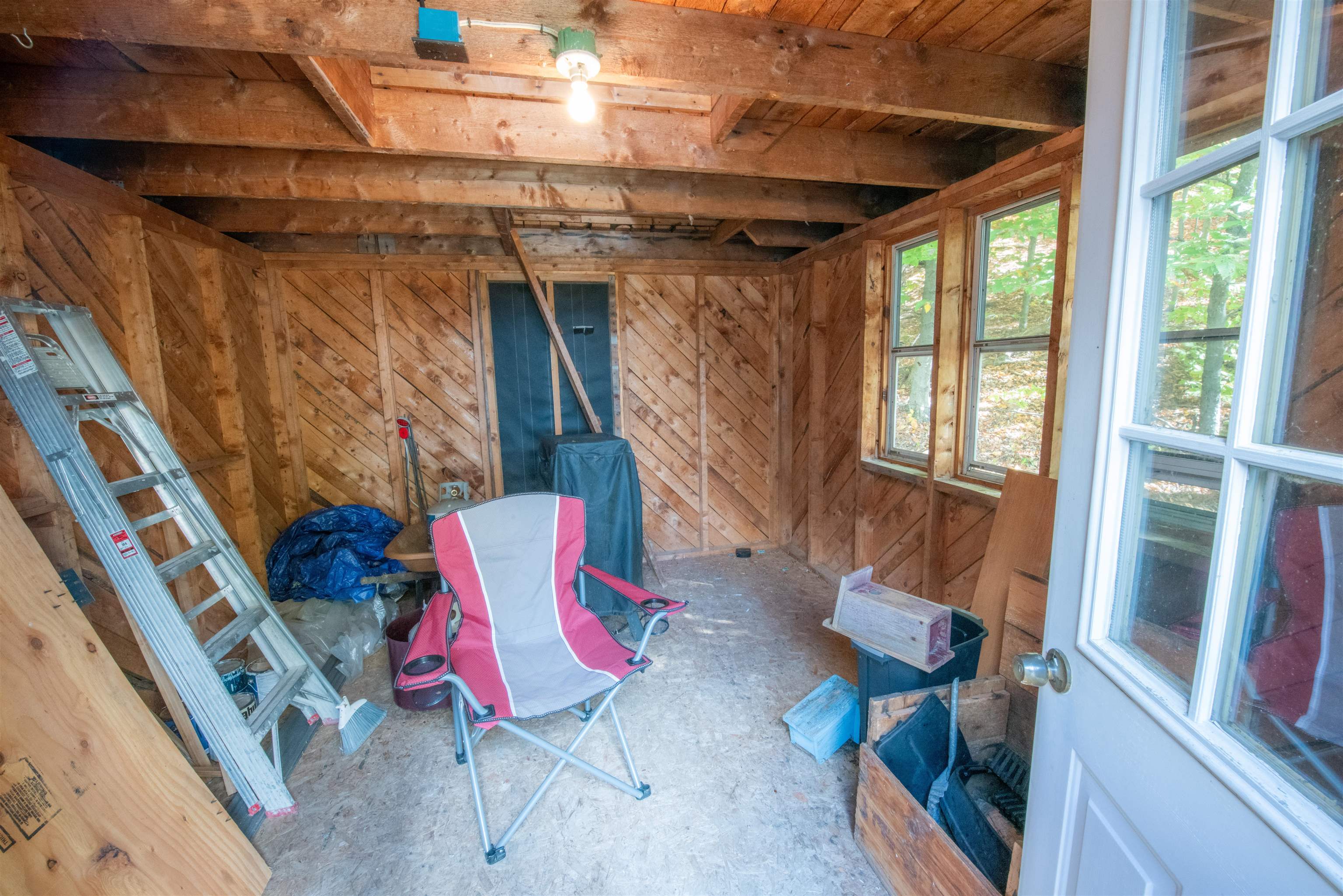 Storage shed off the entry deck 23218450