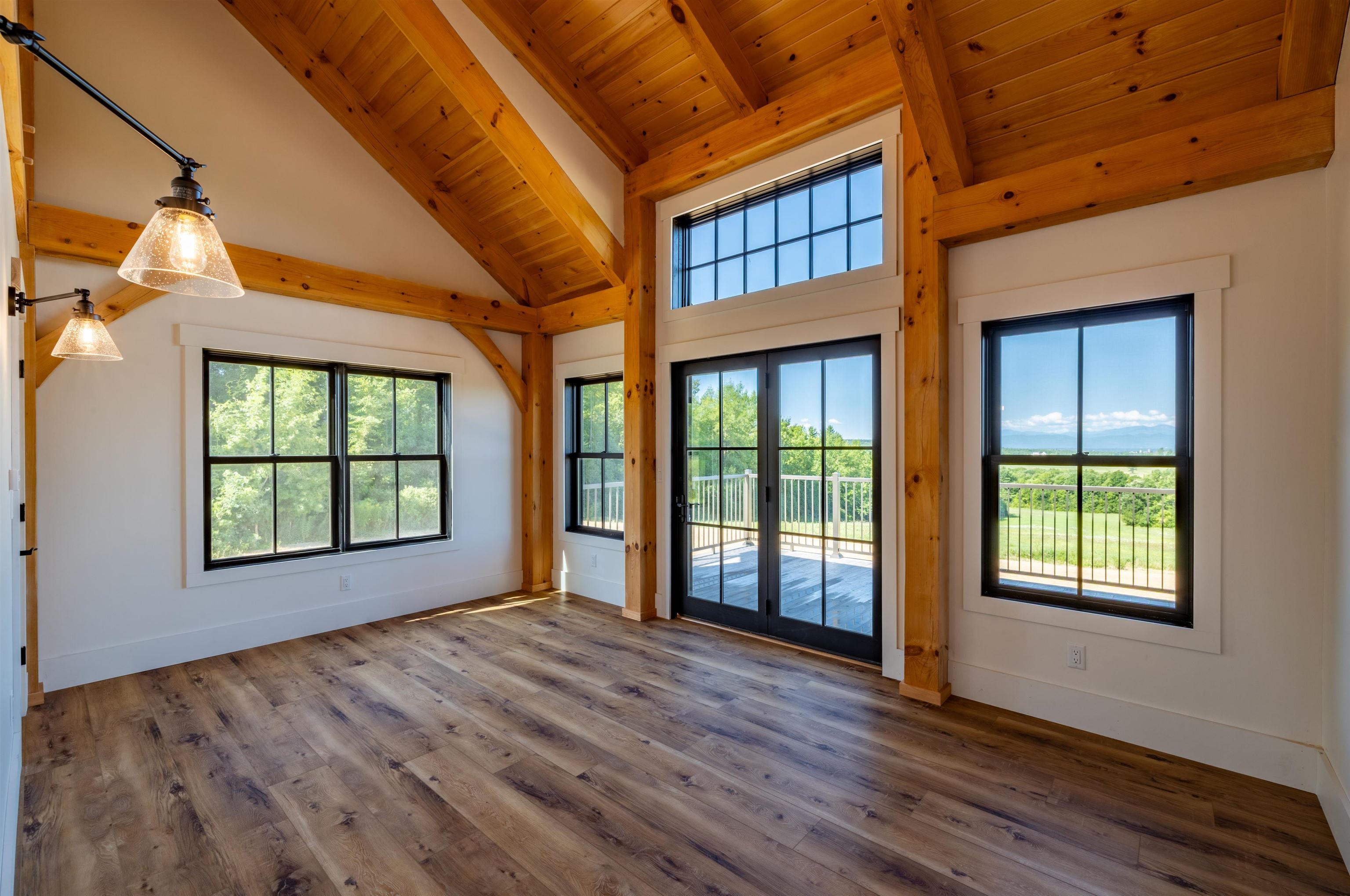 Primary Bedroom suite with doors to deck main level
