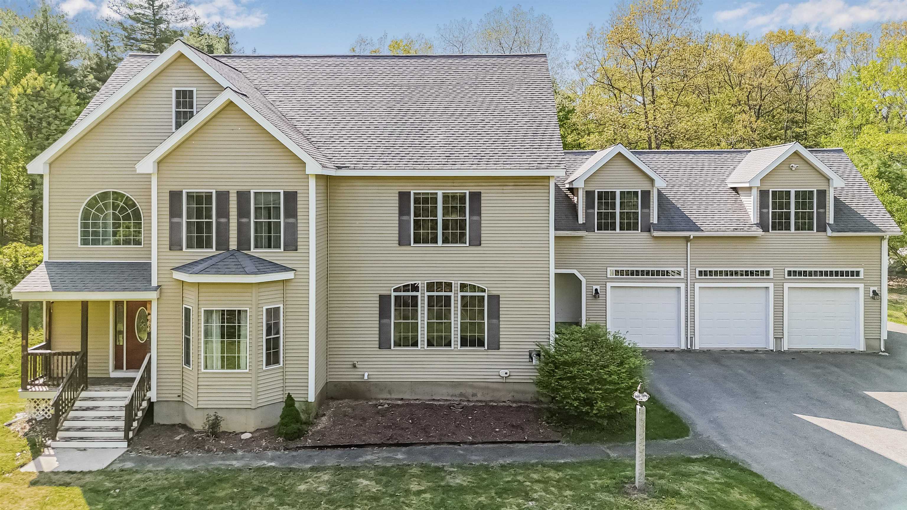 Welcome to 107 Naticook Road. This beautifully maintained 4-bedroom, 2.5-bath Colonial nestled on 2.6 private acres in one of southern New Hampshire’s most desirable residential areas. Built in 2004 and offering nearly 3,700 sq ft of finished living space, this home blends timeless design with modern comfort. Step into a light-filled foyer that flows into a spacious open-concept main level,perfect for both relaxed living and entertaining. The well-appointed kitchen opens to a dining area and living room, all kept comfortable year-round with central A/C and efficient natural gas heat. Upstairs, the primary suite offers a peaceful retreat with ample closet space and a private bath. Three more generously sized bedrooms and a full bath complete the second floor. A walk-up attic and large unfinished basement provide endless possibilities for a home gym, theater, or bonus living space. Step outside to enjoy morning coffee on the inviting front porch or host summer gatherings on the oversized back deck, all while overlooking your gently rolling and wooded lot. The detached 24x36 barn with loft adds flexible space for a workshop, studio, or extra storage. Enjoy town water, paved roads, and a quiet neighborhood just minutes from top-rated Merrimack schools, Route 3, Merrimack Premium Outlets, and Manchester-Boston Regional Airport. Nearby Twin Bridge Park, Wasserman Park, and scenic Naticook Lake trails offer outdoor recreation right around the corner. Open House Saturday 05/24 12-2pm
