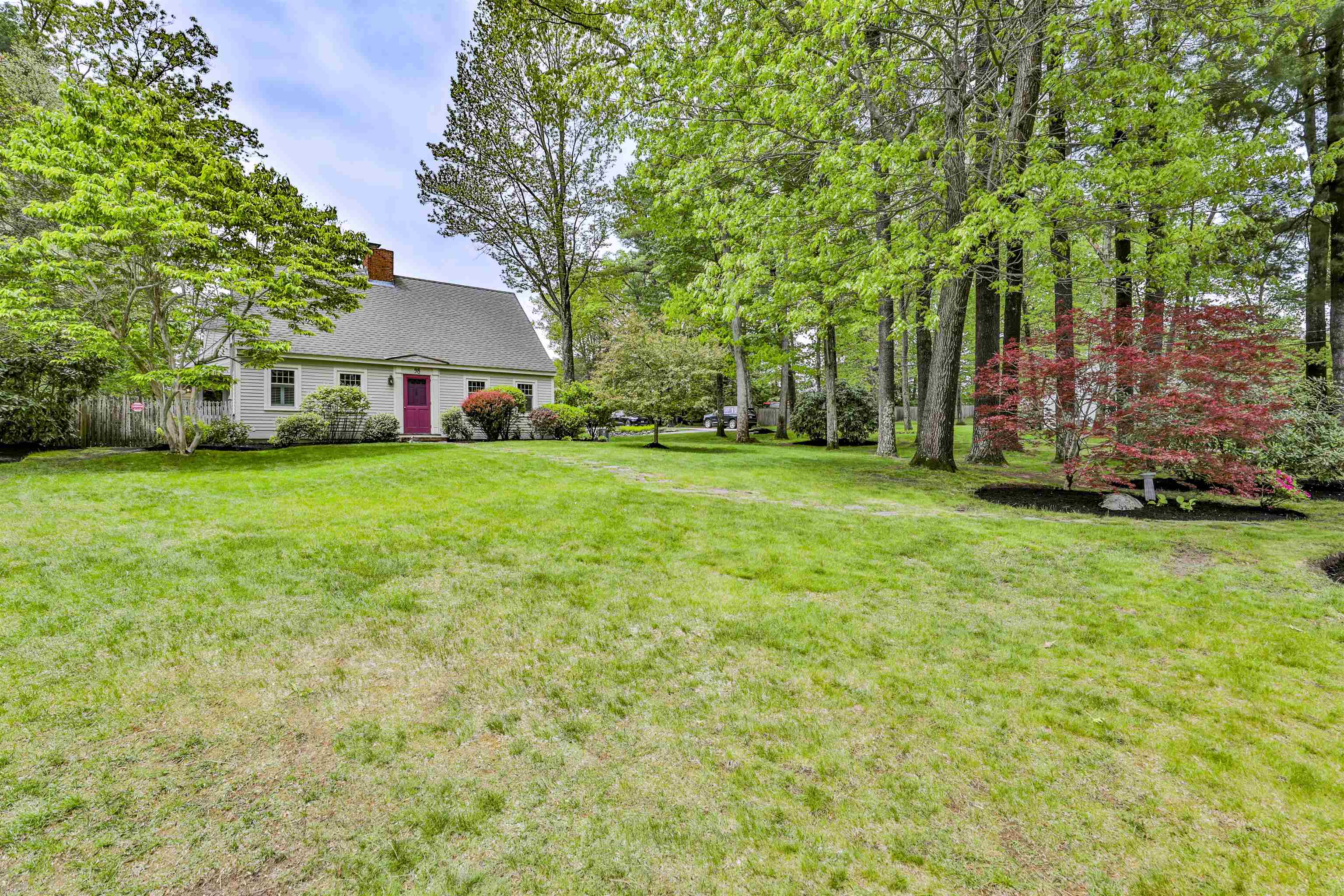 Desirable NORTH NASHUA - custom Cape loaded with extras!  Built in 1939, quality throughout!  Hardwood and wide pine floors, granite kitchen, walk-in pantry, gas fireplace in cozy first floor family room with cath. ceiling, fireplaced living, open kitchen/dining, first floor bedroom and office, primary bedroom with large private bath and laundry.  Many custom built-ins throughout, whole house generator, second laundry in lower level, finished room in lower level.  A true gem beautifully landscaped on almost 1/2 acre lot!