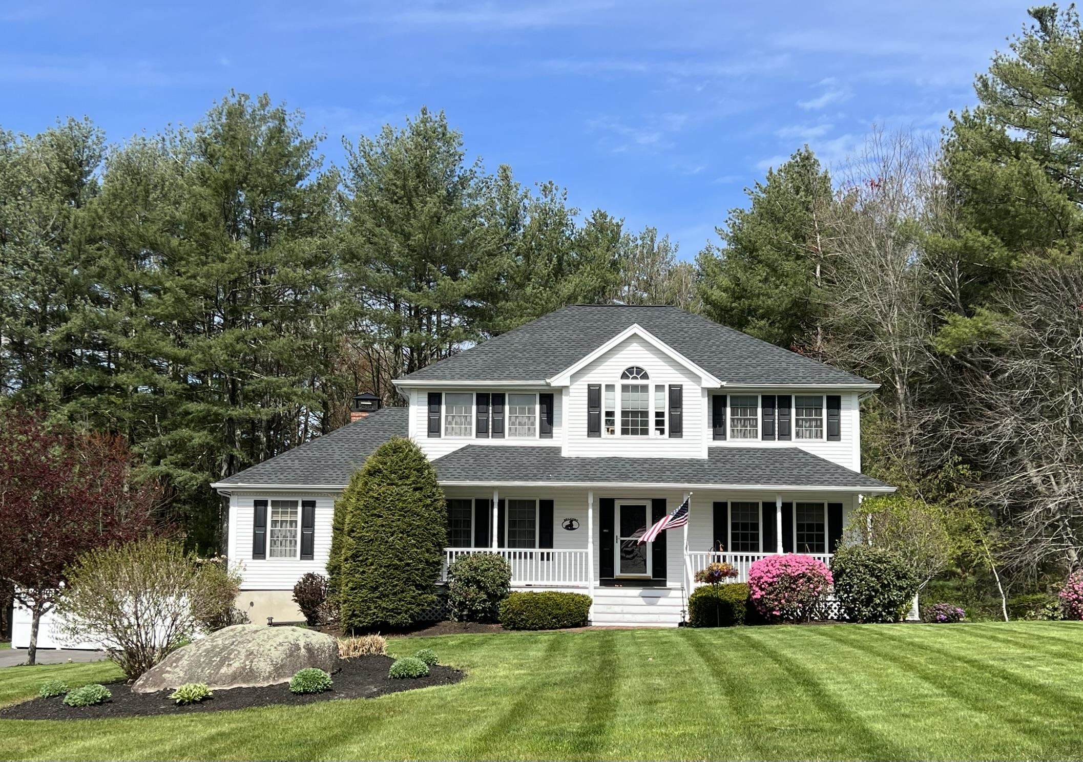 14 Buckingham Drive (AKA 1 Yorkshire Lane).  Immaculate, turnkey, move-in ready home, located in a well-established cul-de-sac neighborhood.  Built in 1996, this 2,735 sq. ft. colonial style home has a farmers porch, 4 bedrooms, and 2.5 bathrooms.  Neighborhood is 2.5 miles from Exit 5 for quick Route 93 access.  All of the home's interior walls and ceilings were professionally repainted in 10/2024.  In 10/2024 a comprehensive 92 item full Home Inspection was performed.  The complete 62 page report is available for review.  All necessary and routine yearly maintenance for the home has been completed for 2025.  The home has a specious kitchen and breakfast layout, with ample cabinetry, granite countertops, crown molding, and recessed lighting.  Laundry area is off the kitchen with washer/dryer included.  Open concept first floor design and an expansive family room with cathedral ceiling and wood burning fireplace.  Home has a beautiful sunroom that overlooks the backyard and surrounding wood line.  Home has hardwood flooring throughout the first floor and carpet on second floor.  Master bathroom was completely remodeled by Apple Wood Construction in 2021.  Plenty of storage exists under the 16x28 deck for all seasonal  storage needs.  Driveway was repaved by Tate Brothers in 2021 and entire roof was replaced in 2019.  The expansive flat backyard has perennial gardens and mature landscaping throughout.  An additional backyard feature is an elevated treehouse!