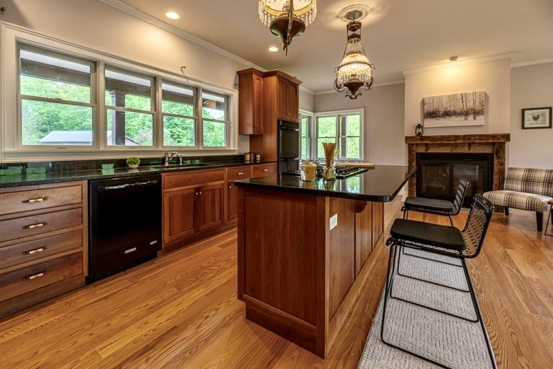 large chefs kitchen with double wall ovens