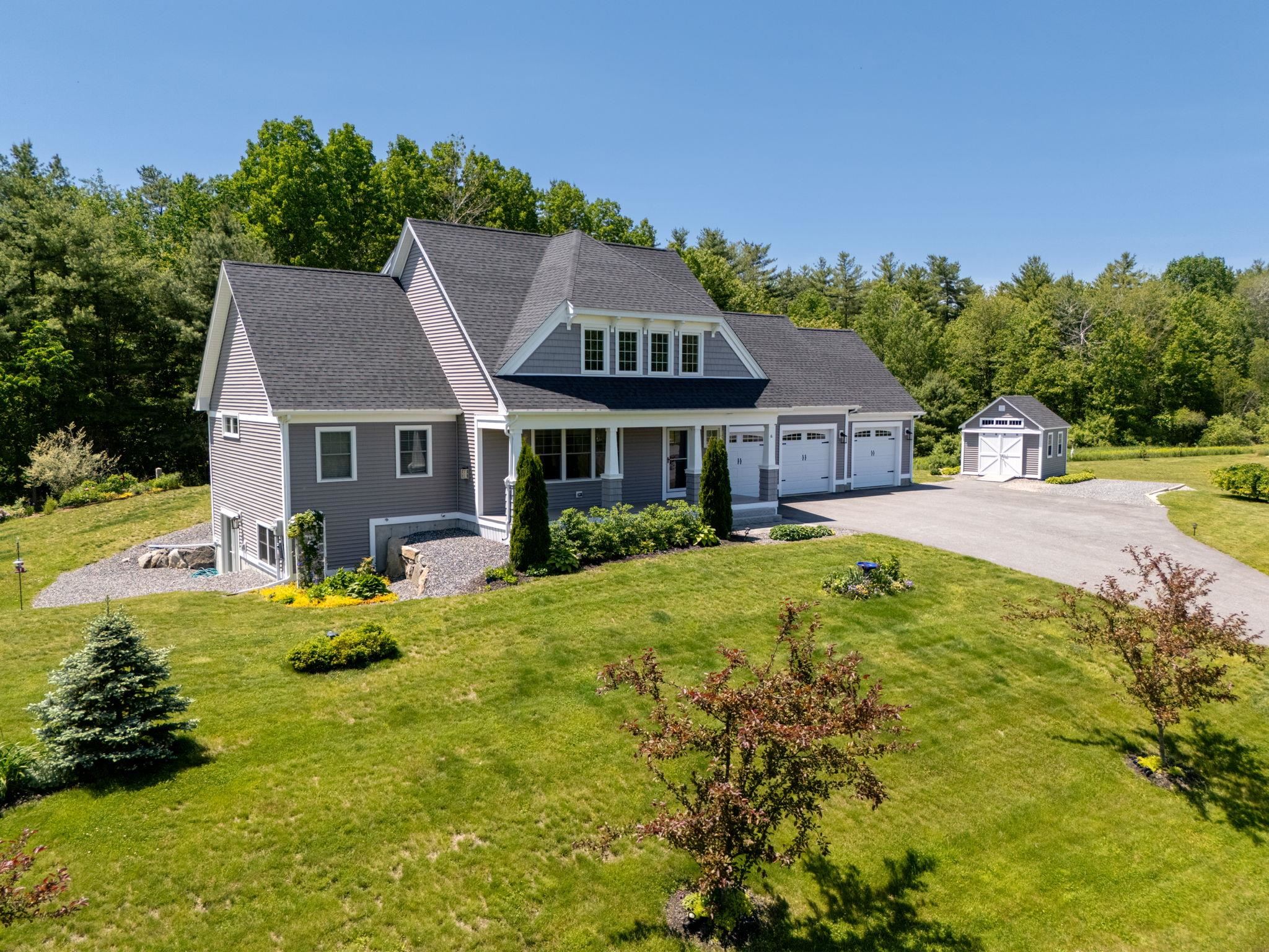 OFFER DEADLINE SET FOR MONDAY JUNE 9th AT NOON.  WELCOME HOME TO 6 Tannery Way. Constructed in 2019, this home has been meticulously maintained & upgraded throughout, giving it a "better than new" feel.  Nestled in a private cul-de-sac of four beautifully situated homes in a country setting, you are greeted with impressive curb appeal.  The landscape is filled with mature, carefully thought out plantings including plentiful perennials, fruit bushes/trees, herb & vegetable gardens & much more. Enjoy it from the private back yard/deck/hot tub or the expansive farmer's porch out front.  Inside you will be impressed with the bright open floor plan boasting a high end kitchen with custom cabinetry, quartz counters & backsplash & stainless appliances with center island.  Attention to detail was given to moldings & trim, hardwood & tile throughout & all the finishing touches.  This home features TWO PRIMARY SUITES, one on the 1st floor & one on the 2nd floor, both with gorgeous baths & walk in closets.  Relax on the insulated sunroom surrounded in privacy.  Upstairs there is LARGE FINISHED BONUS ROOM over the 3 car garage with hardwood flooring and adjoining walk in attic. The basement has windows & french door walkout, perfect for finish. Pay less than $100 a year for your annual electricity with the 2023 installed, seller owned, solar energy system. This home is minutes to all commuter routes - I95, 495, 101 and the beautiful NH Seacoast beaches.