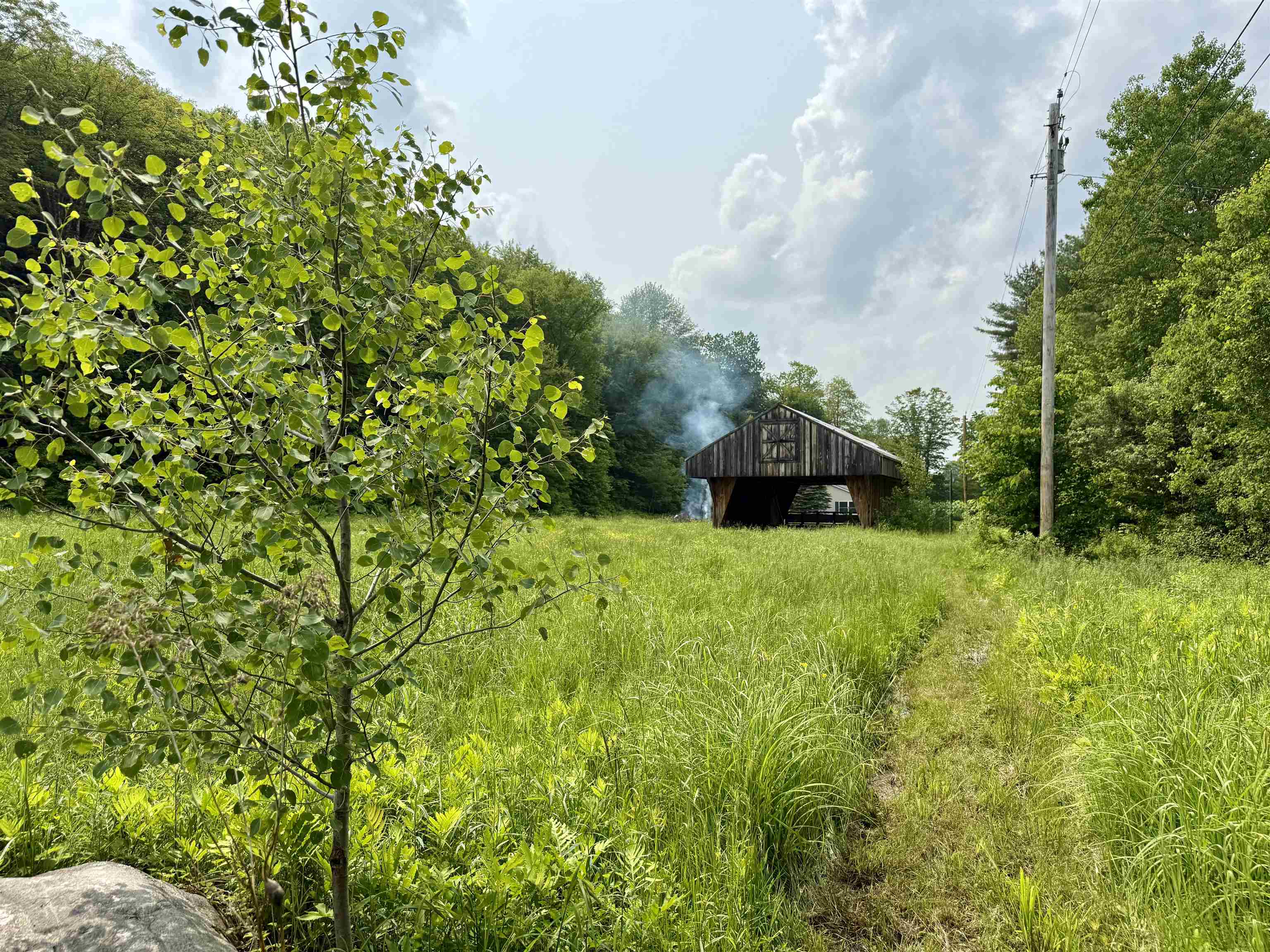 Looking at pole barn from neighbors