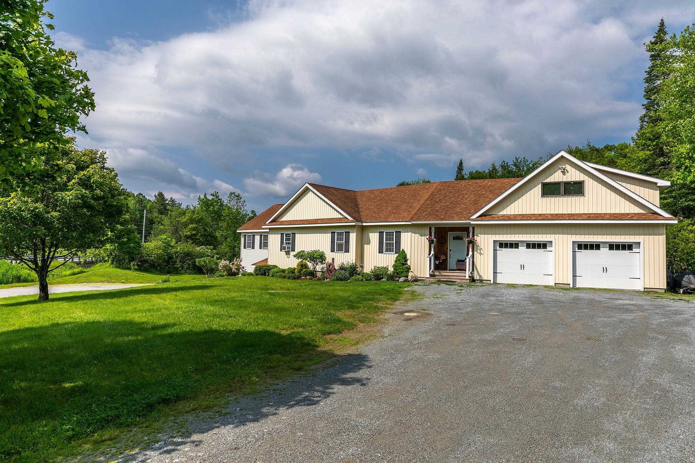 Set on 2.6 private acres in storybook Weston, VT, this home offers open spaces, modern updates with style and comfort in one of Vermont’s most sought-after towns. This house is nestled between Okemo and Stratton, Bromley and Magic Mountains.This is an ideal location for the skiing enthusiasts or for a growing family with current school choice. The upper level offers a spacious family room with exposed beams, cathedral ceilings  and a charming loft, perfect for gatherings and cozy nights in. The updated kitchen flows into bright, inviting living spaces. A beautifully designed walk-out, lower-level apartment adds flexibility for one level, in-law suite or rental income. Two large screened porches invite you to unwind and take in the surrounding beauty. An additional 700 plus square foot room above the garage lends itself to the ultimate game room, home gym, or added home office space with endless possibilities. The two car garage includes a shop space and ample storage room. In the outdoors this home includes a basketball court, expansive backyard with your own peaceful stretch of the West River. This property includes well manicured flower beds and lush garden space. Just minutes away you will find the local Weston Recreation area, the VAST trails,  the historical Vermont Country Store and Weston Theater. All four seasons of Vermont’s charm can be found here. A full-house generator adds convenience and peace of mind. This turnkey property is ready for your Vermont lifestyle.