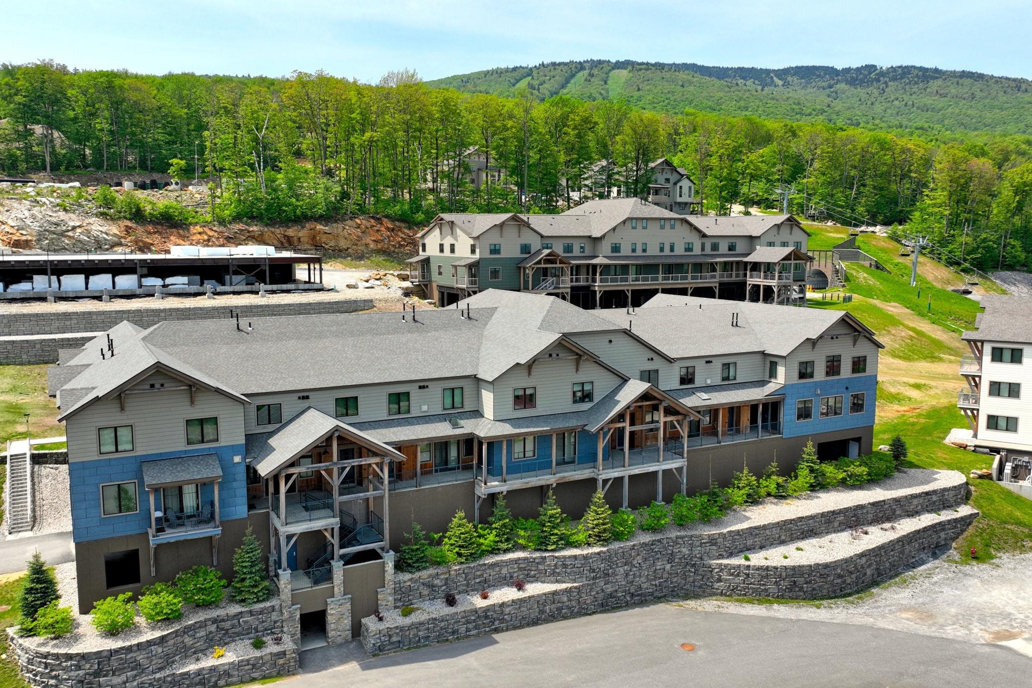 Slopeside at SouthFace Village Okemo! This may be the nicest one-bedroom condominium currently available on Okemo Mountain. Immaculate and barely used, it comfortably sleeps six and is offered fully furnished, move-in ready for your mountain escape. The interior features stylish quartz countertops, hardwood flooring, built-in shelving, and energy-efficient appliances. Ductless mini-splits provide air conditioning and reliable climate control, while neutral furnishings create a welcoming, comfortable vibe. Full compliance with the current fire and safety regulations, including a modern sprinkler system, provides security and rental readiness. SouthFace Village offers direct access to nearly 200 acres of private property for year-round recreation. Hike or bike Okemo's trails in the summer, and in the winter, step outside and hop on the Sunshine chairlift. Owners also enjoy access to a private pool and fitness center, perfect for relaxing after a day of adventure. If you're looking for the ideal retreat in the heart of Vermont's four-season playground, this condominium may be the perfect fit.
