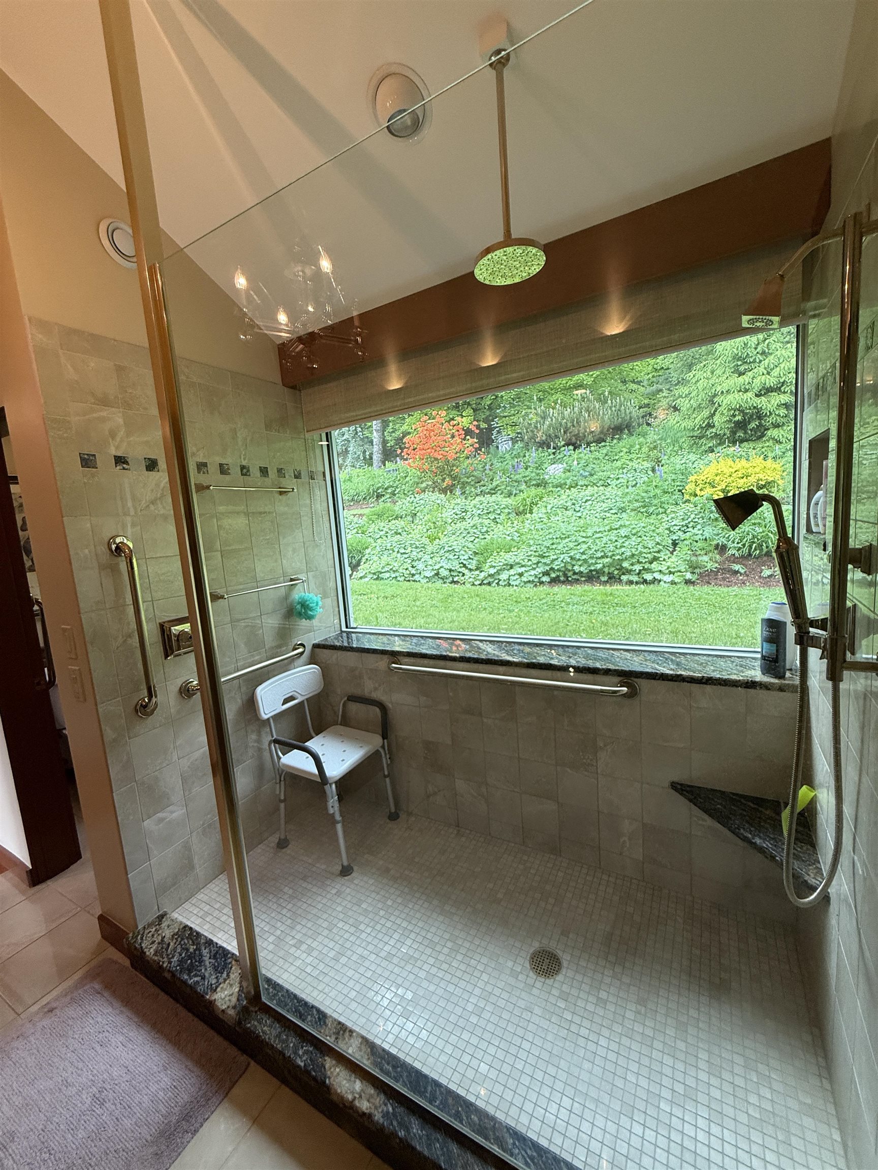 LARGE RAIN SHOWER WITH A SCENIC VIEW