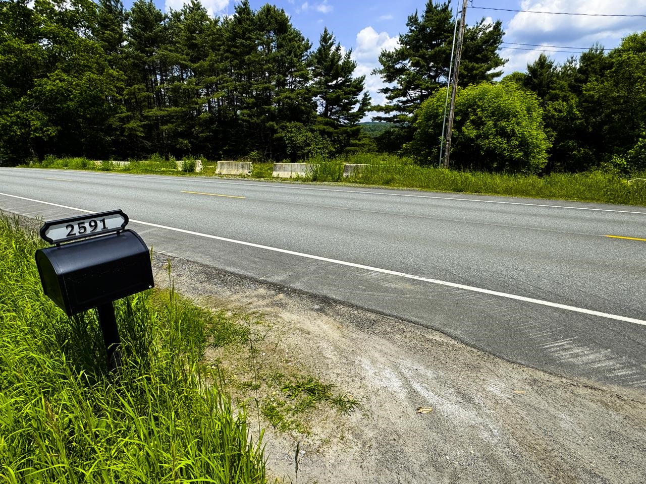Bottom of driveway on Route 5 (Lyneburke Rd)