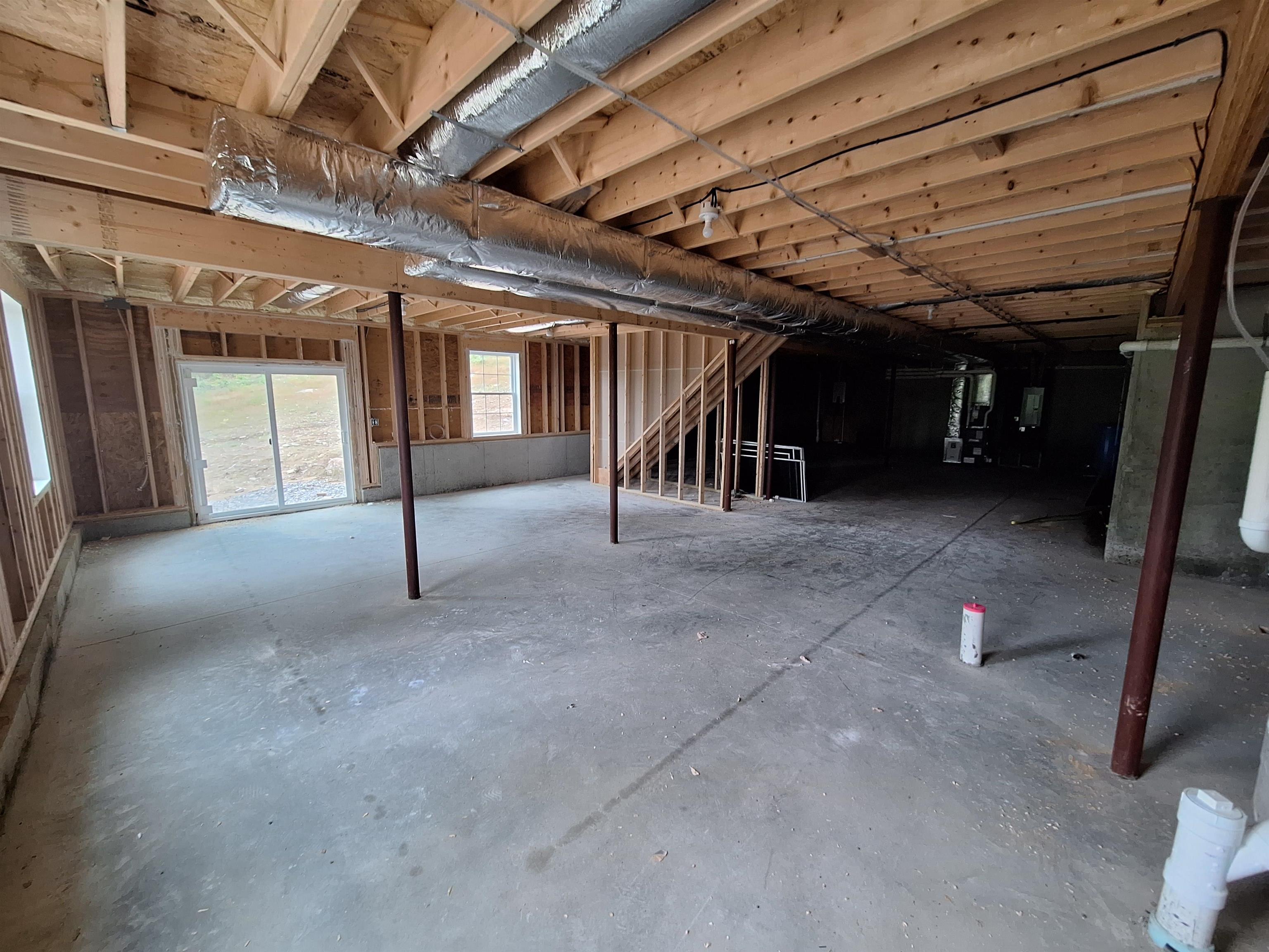 Spacious walkout basement w rough future bath