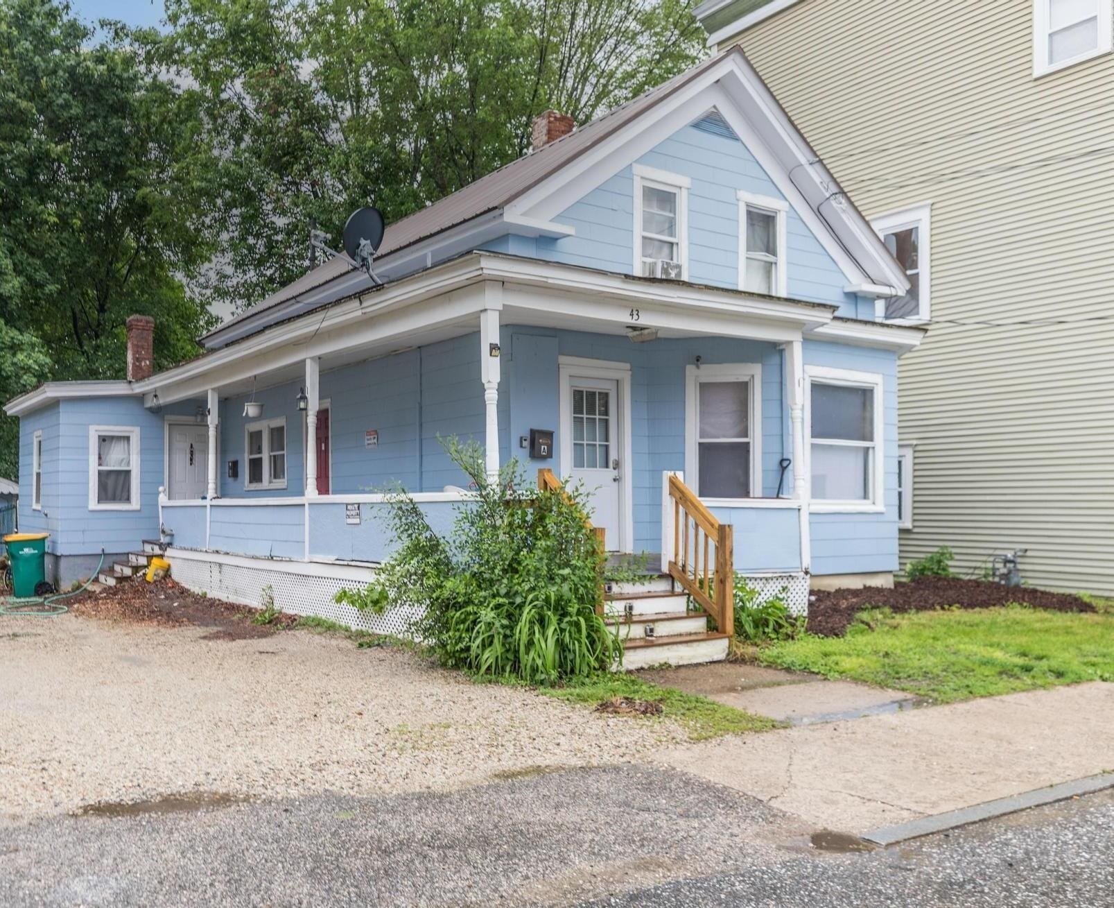 Versatile Duplex with CASHFLOW– Ideal for owner occupants or investors with a current cap rate of 9.59%! this duplex exude appeal with its new metal roof, stylish light blue siding and a delightful farmer’s porch, ideal for relaxing on warm summer days. Upon entering, the larger unit features a spacious living room that seamlessly connects to the kitchen, highlighted by charming high tin ceilings. The bathroom on the lower level has been updated with tile backsplash, and heated tile flooring. This is a townhouse-style unit with three bedrooms on the second floor. Upon entering the smaller unit, you're welcomed by an open kitchen featuring elegant high tray ceilings. The kitchen's wooden cabinets exude character, complemented by tile backsplash and a wooden island. The bedroom is spacious with hardwood floors throughout, and it connects to the updated bathroom with tile heated floors. The building has been updated with two new heating systems, including a highly efficient Buderus boiler, a new metal roof, and newer vinyl windows. It also features updated mechanical systems with new wiring and plumbing and is certified lead-free. Thats not all, it comes with a detached garage which is perfect to rent out for additional income. The tenants enjoy having washer and dryer’s in their units(both owned with the building), a beautiful private fenced in backyard and being located close to town.
