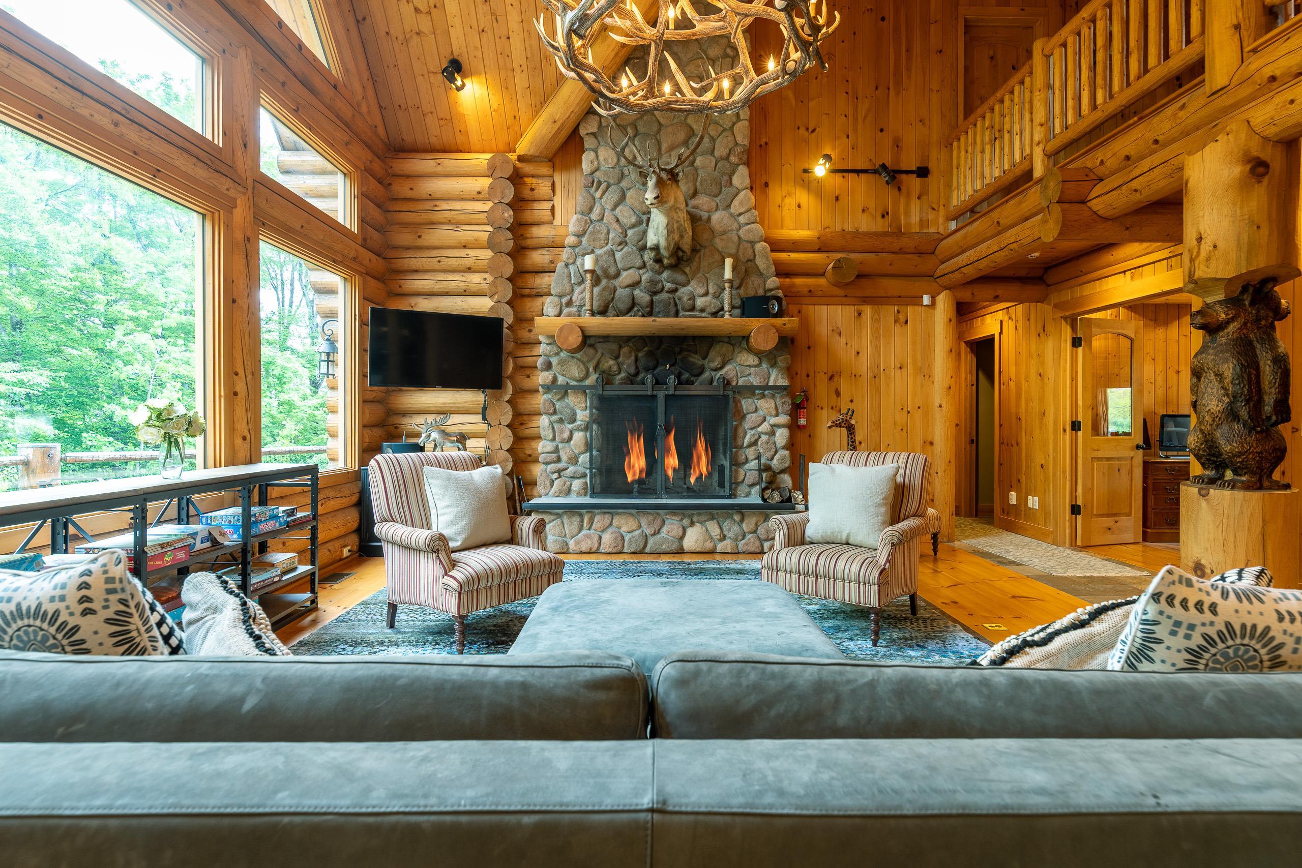Floor to ceiling stone chimney