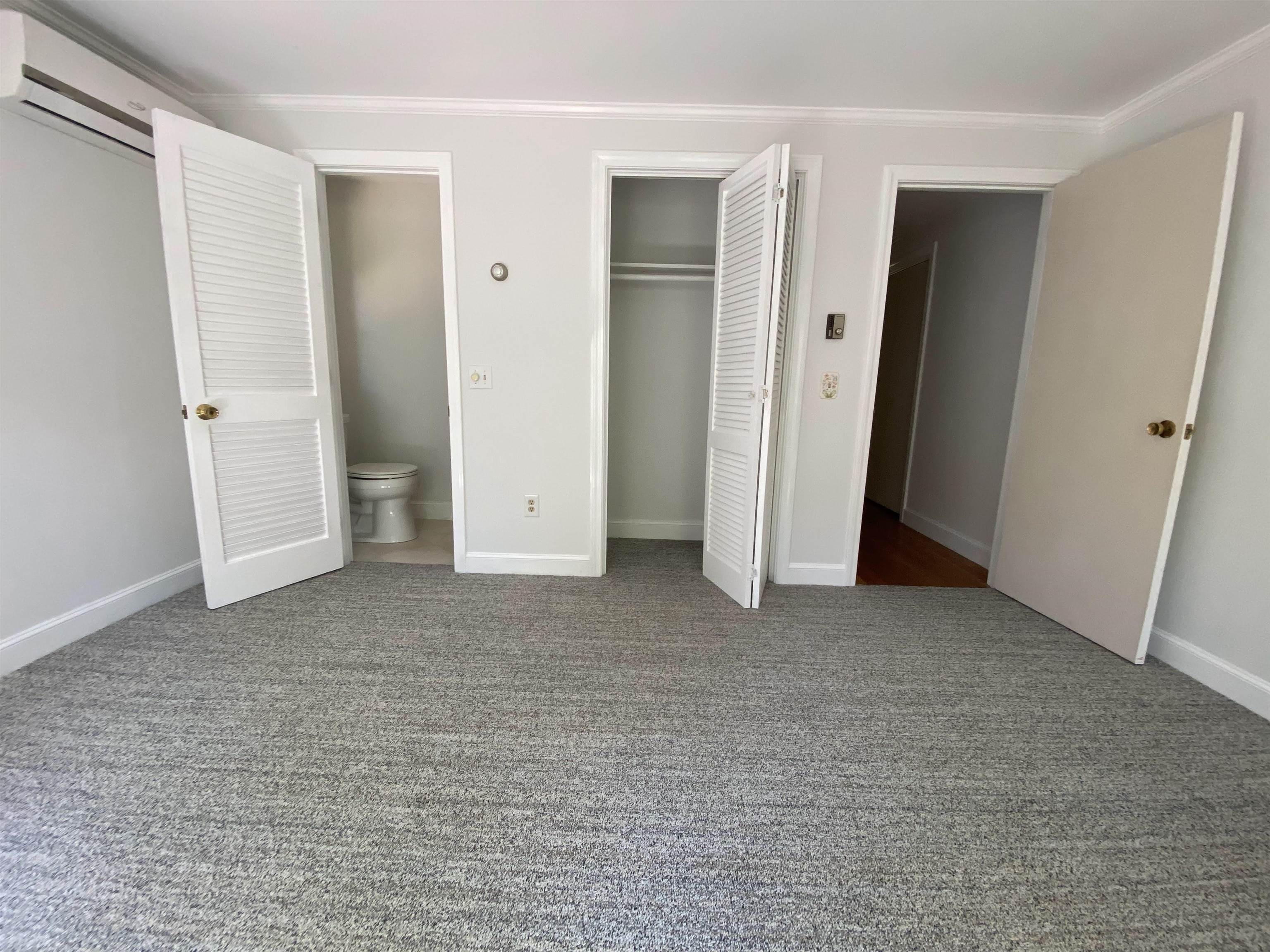 Primary Bedroom with half bath