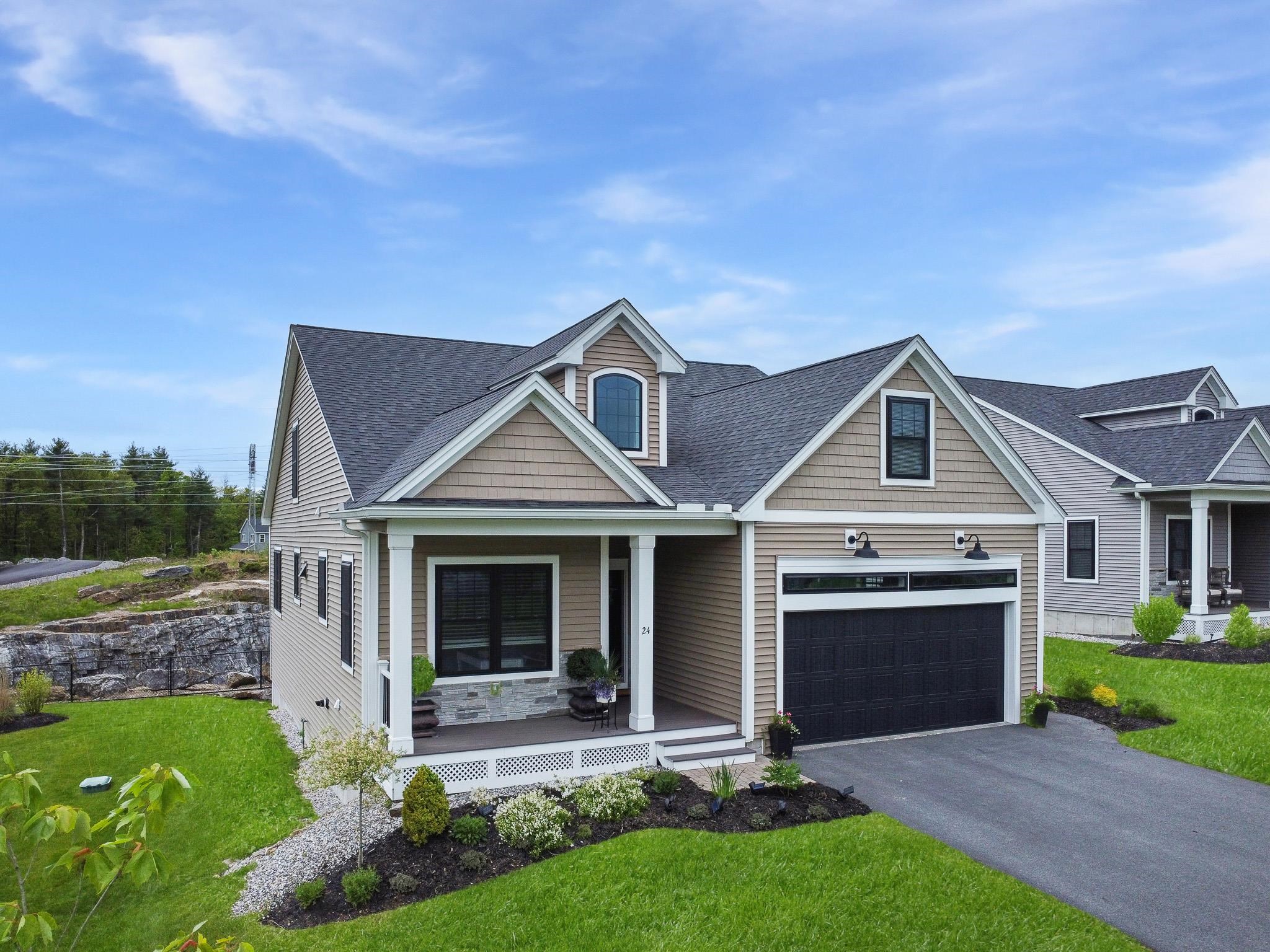 This young, modern Craftsman home at Del Ray Place is a 55+ community on an idyllic cul-de-sac in Windham. You will fall in love with the spacious floor plan with sophisticated style and features throughout. The first level features bamboo flooring in the main living areas, gas fireplace, private office/den, open Kitchen, Dining and Living rooms, high ceilings, and a slider to the deck where you can relax with a perfect view of the sunset.  The enhanced Kitchen is the perfect space for gatherings. It is engineered for those who are passionate about cooking and entertaining. High end Thermador appliance suite includes a dual fuel 36" stove that has six patented Star burners and smart features plus powerful ventilation, stylish refrigerator and dishwasher. There are quartz countertops, a walk-in pantry, an x-large center island plus upgraded cabinet designs including a beverage center w/built-in wine refrigerator. The Primary Bedroom suite is graced with two closets and a remarkable upgraded tiled bathroom. The upper level is an amazing space of comfort and privacy. There is a large bedroom, a flexible loft room with a full bath and an exceptional number of closets and storage space. Bonus features include walk-out basement, 2 zone central AC, 2 car garage with side door, front Farmer's porch and back composite deck. Lovely 55+ community--Lawns and snow removal are maintained by the HOA allowing for a leisure lifestyle. This stunning home is move in ready!