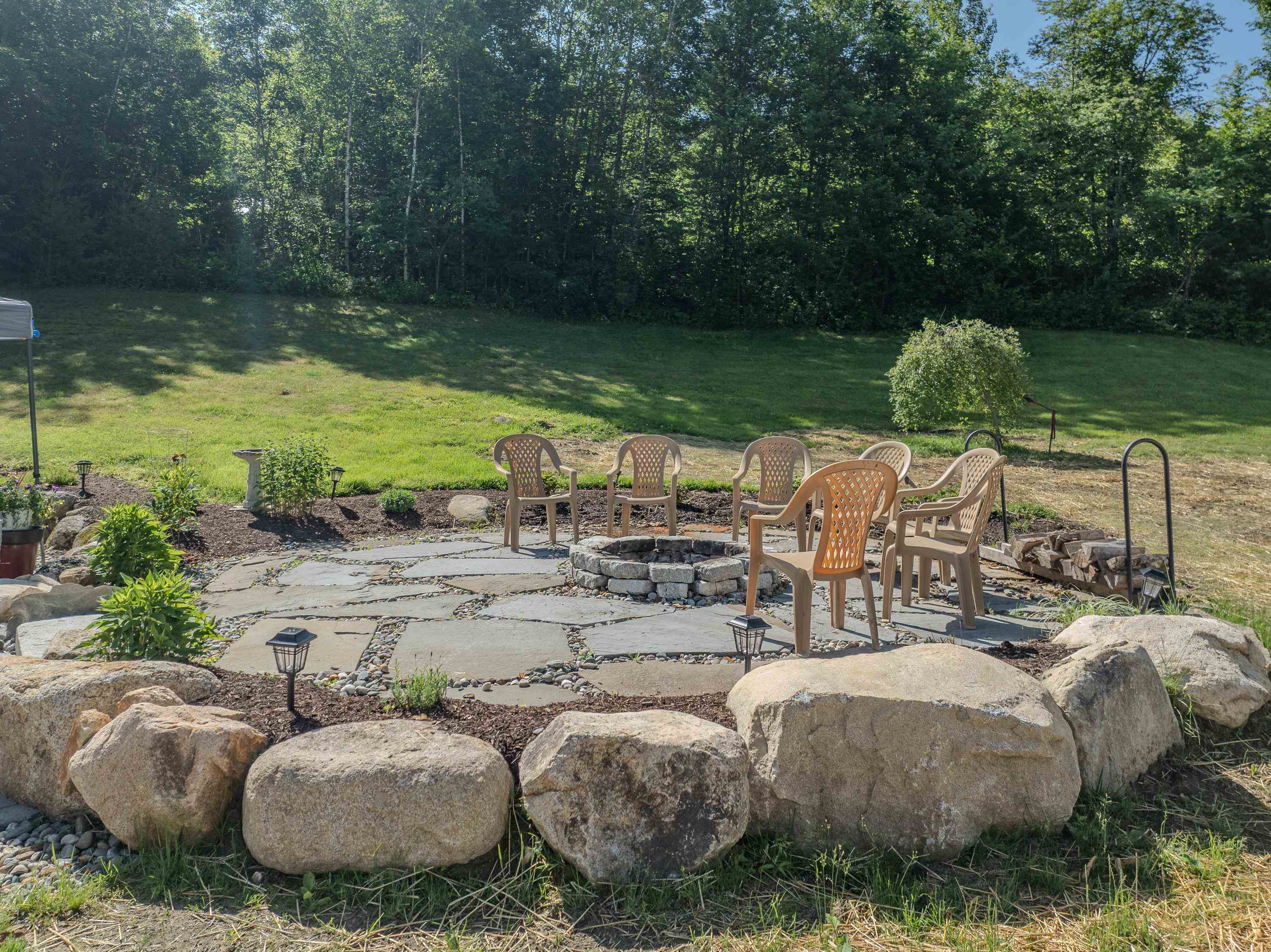 Beautifully landscaped firepit area