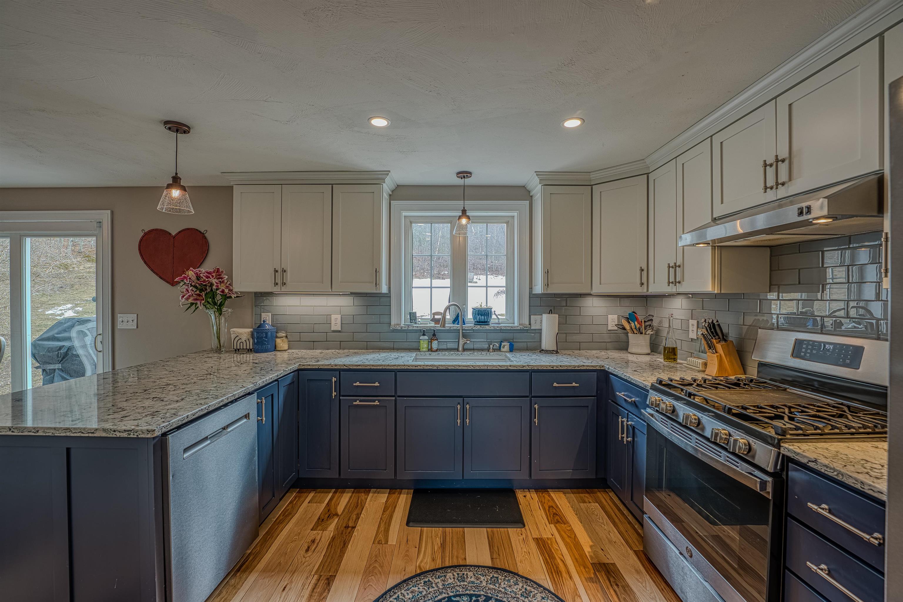 Kitchen sinks overlooks backyard