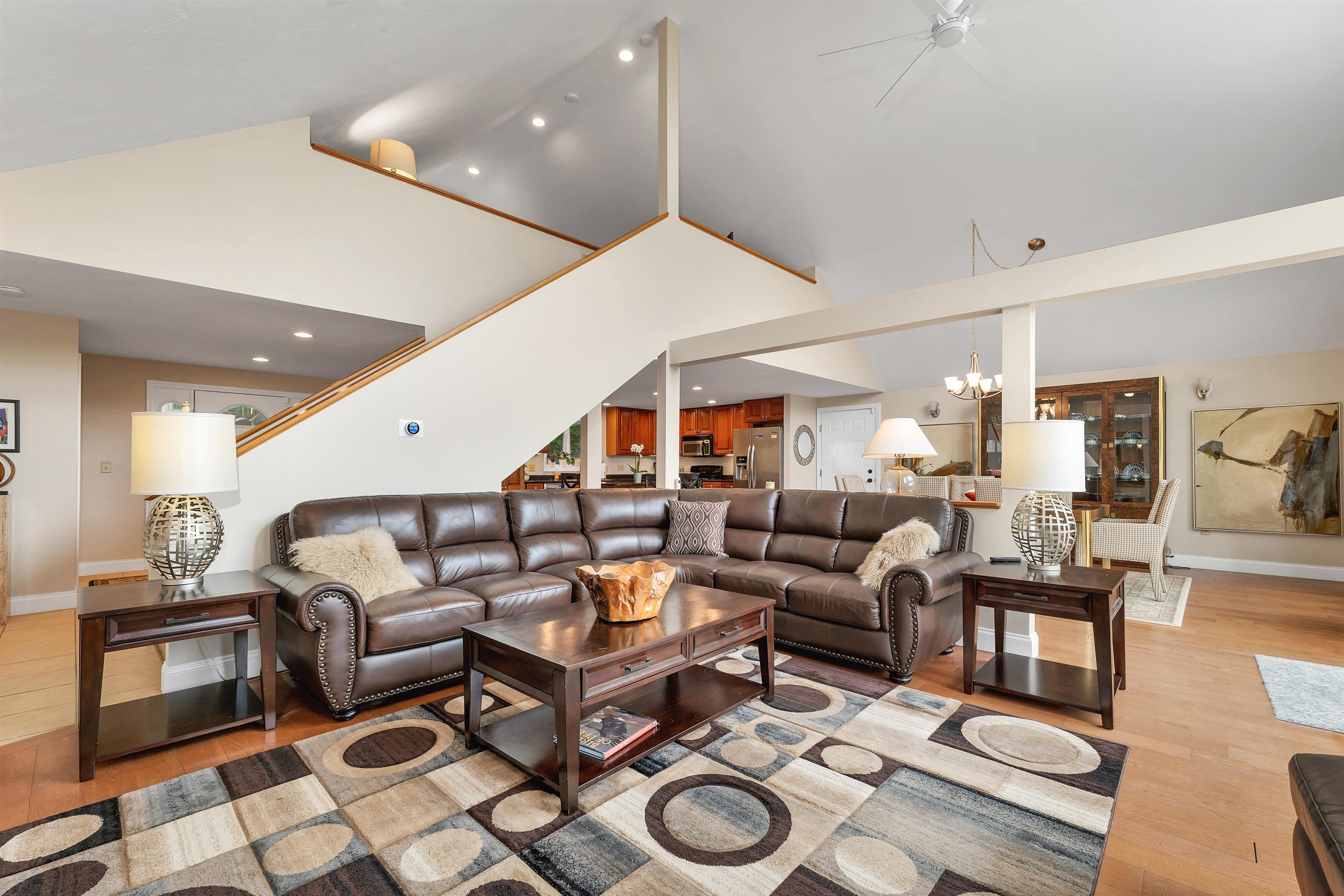 THERE IS A CATHEDRAL CEILING IN THE LIVING ROOM WHICH OPENS TO THE LOFT ABOVE THE FOYER!
