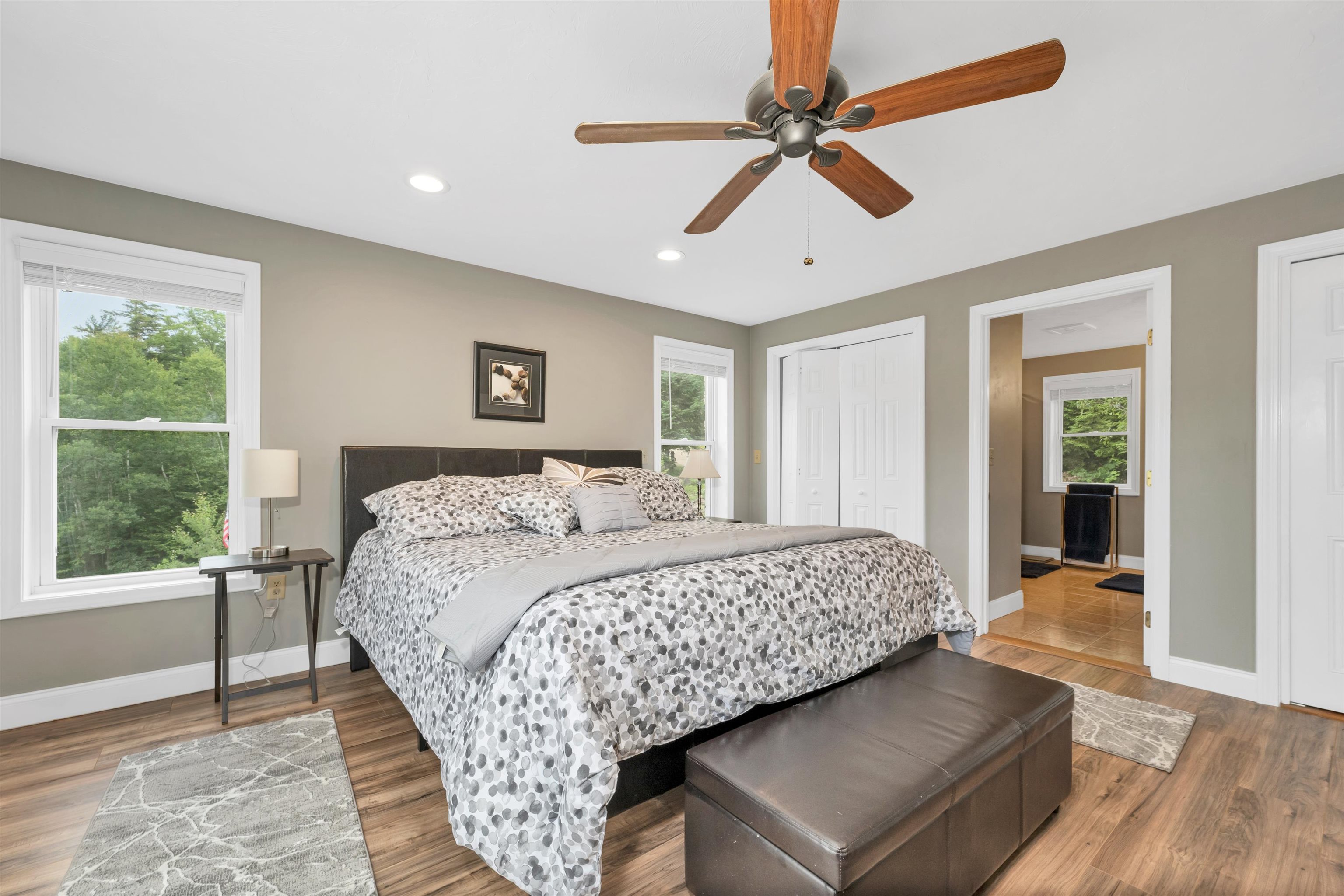 THIS IS VERY LARGE ROOM WITH WOOD LOOK LAMINTE FLOORING AND LARGE CLOSETS.