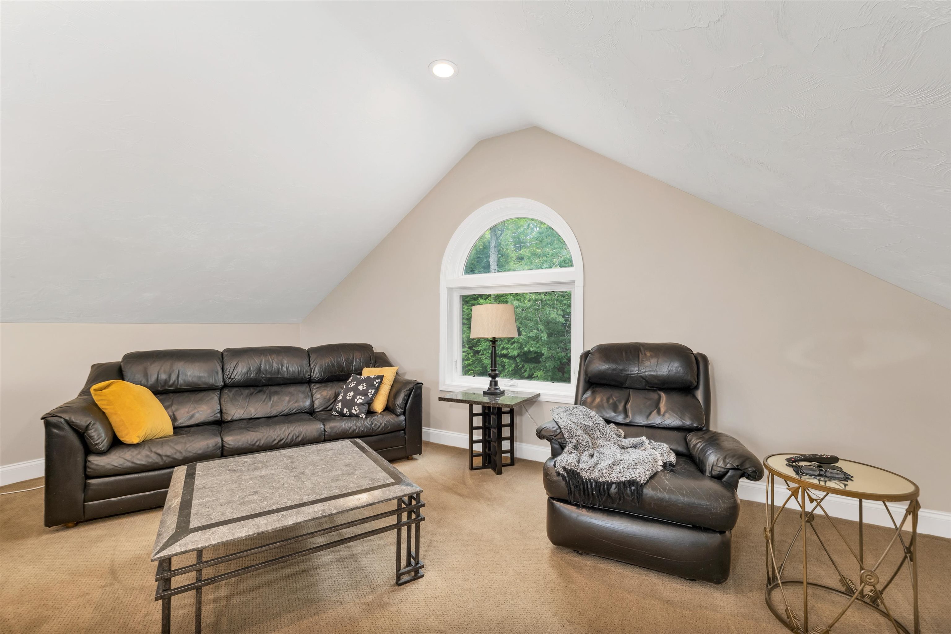 THE PRESENT OWNERS USE THIS SPACE AS A TELEVISION AND READING ROOM.