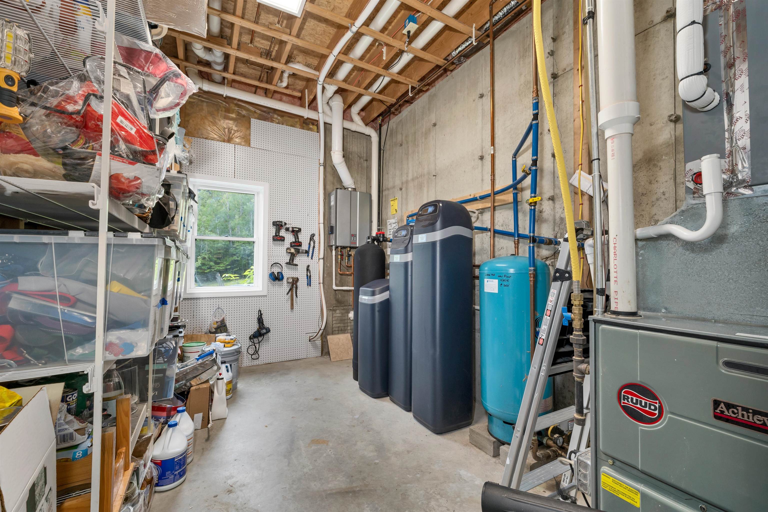 UTILITY ROOM- W/FHA FURN, CENT AIR, ON-DEMAND HOT WATER W/RECIRCULA FEAT, &WATER FILTRATION SYSTEM!