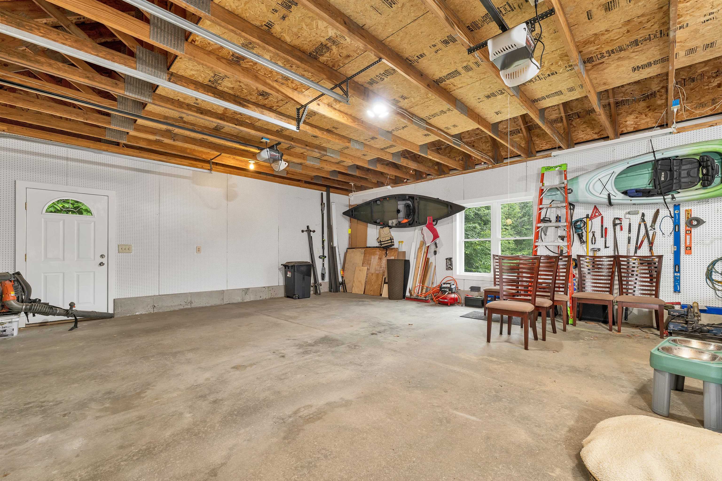 WITH AN ABUNDANCE OF STORAGE AND A WORKSHOP AREA.