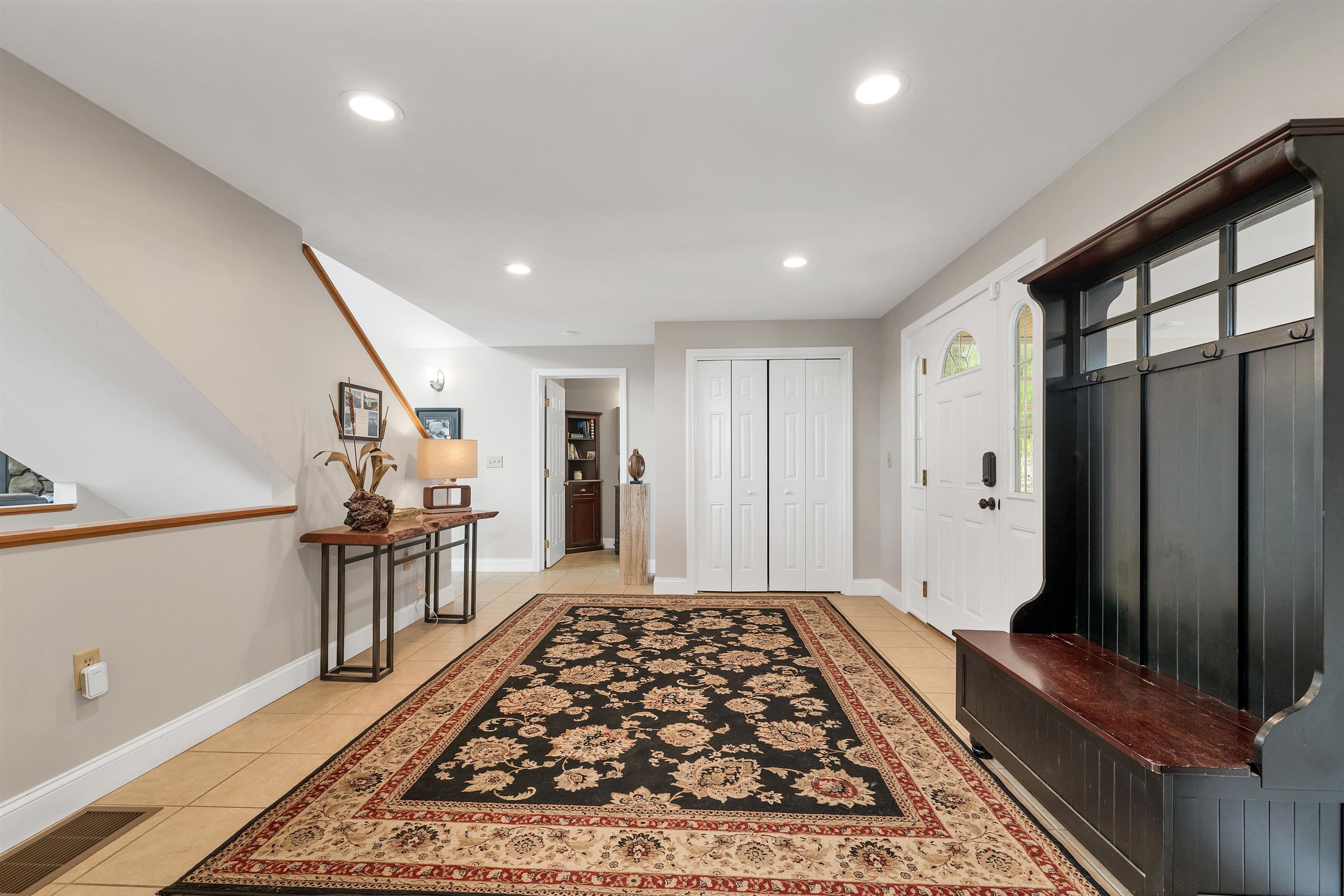 AN AMAZING TILE FLOORED FOYER GREETS YOU.  YOU LOOK INTO THE OPEN LIVING AREAS OF THE MAIN LEVEL!