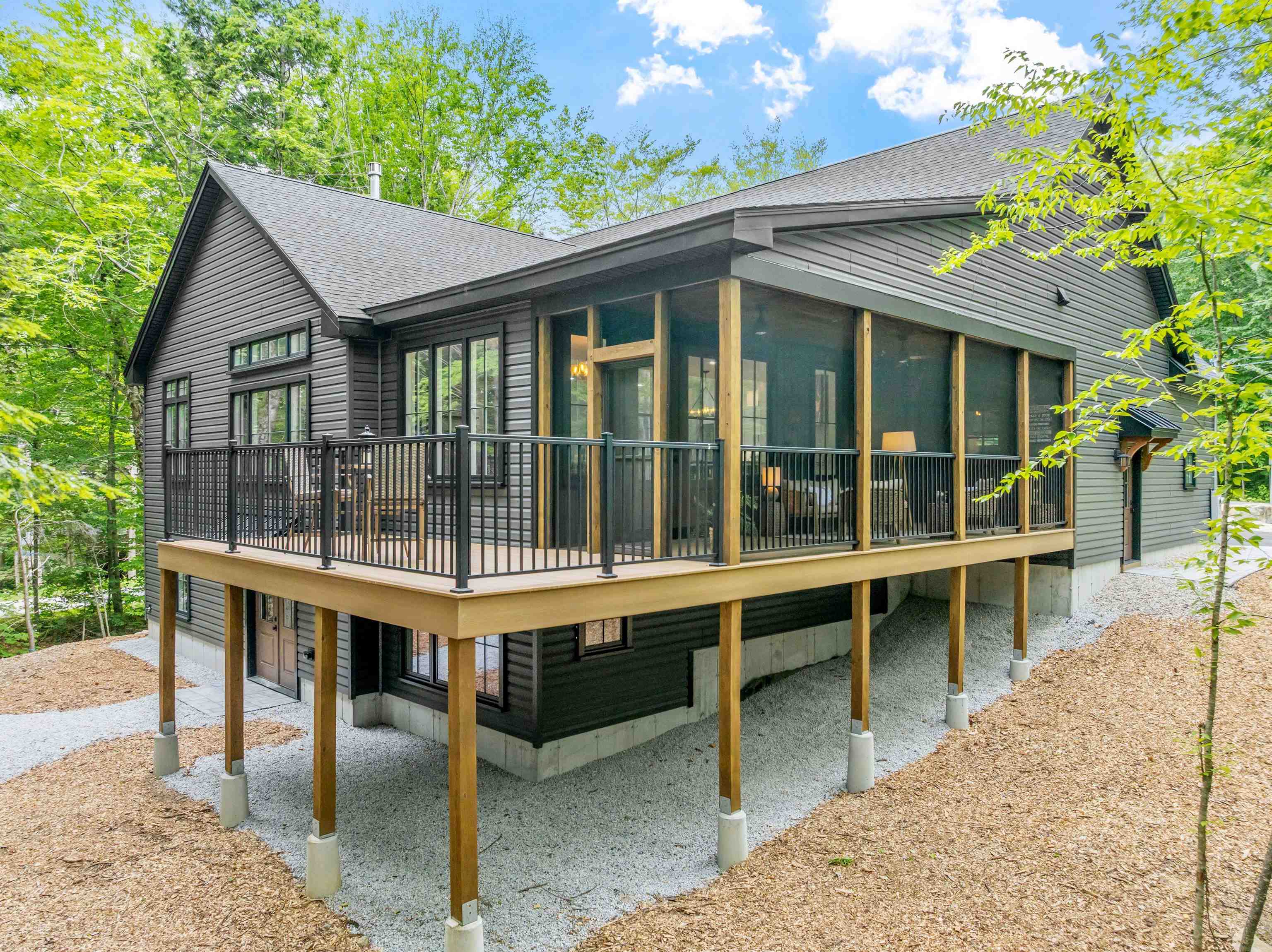 Screened-in porch opens up to back deck