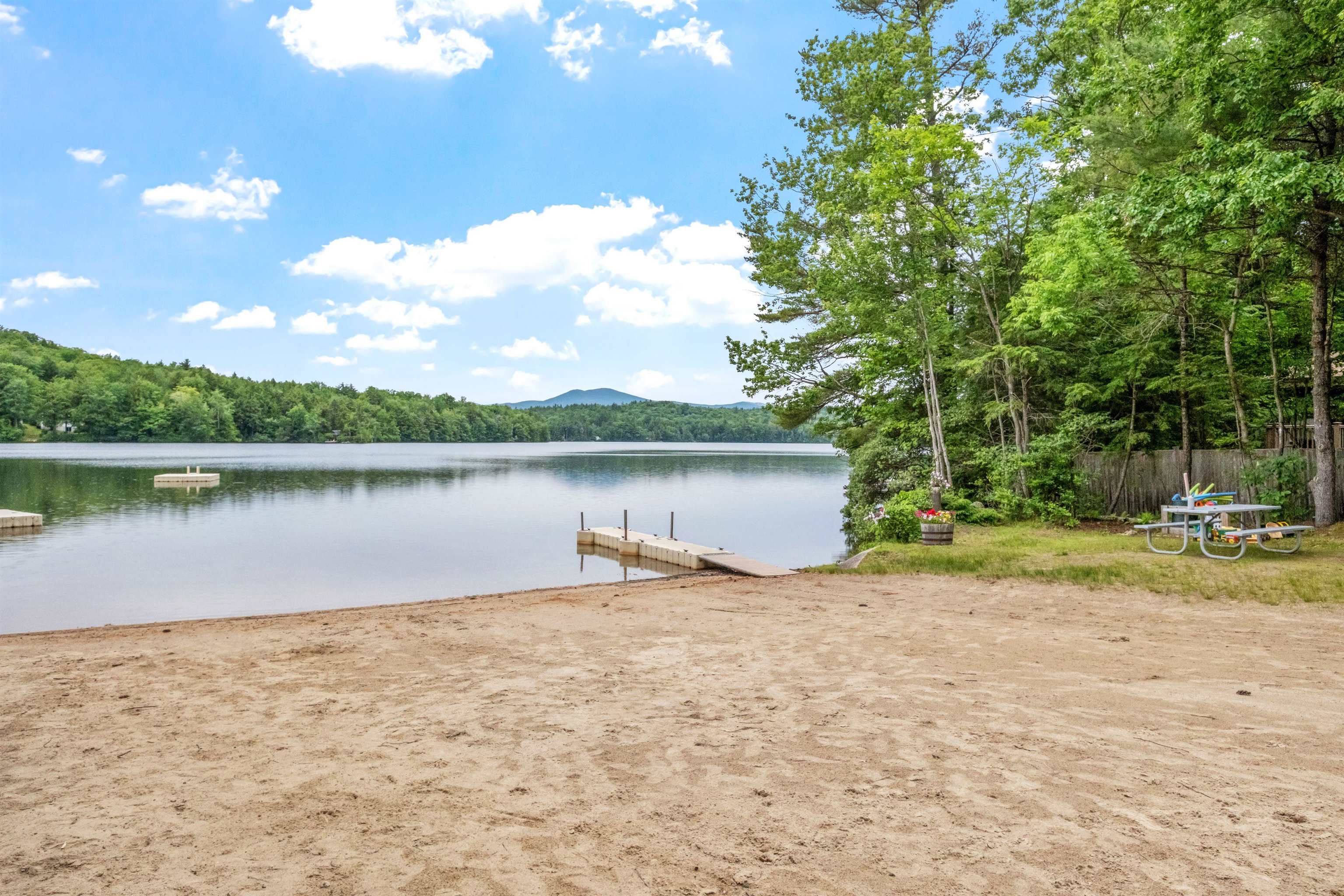 Sandy beach with floating docks