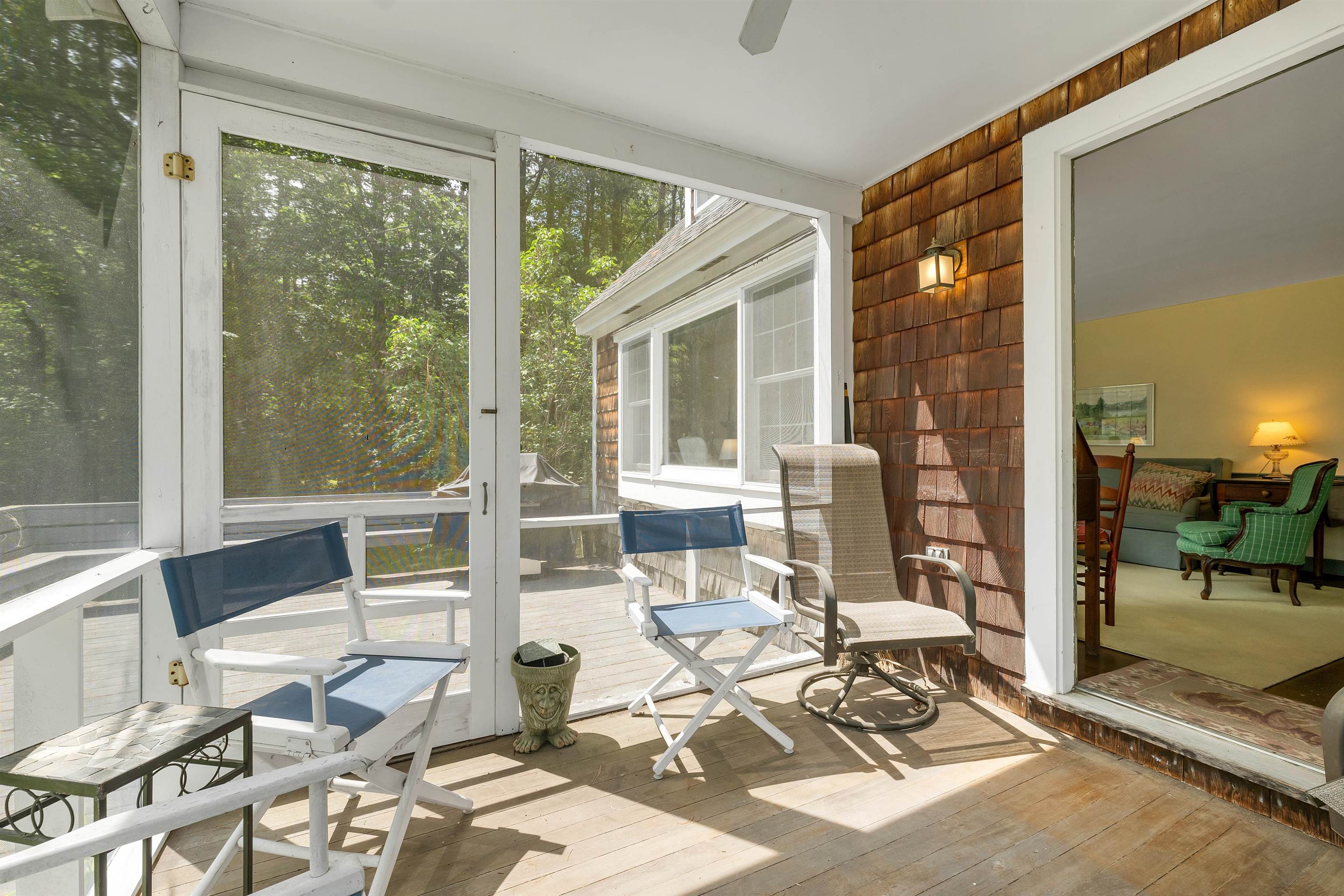 Enter the Cape through the screened porch