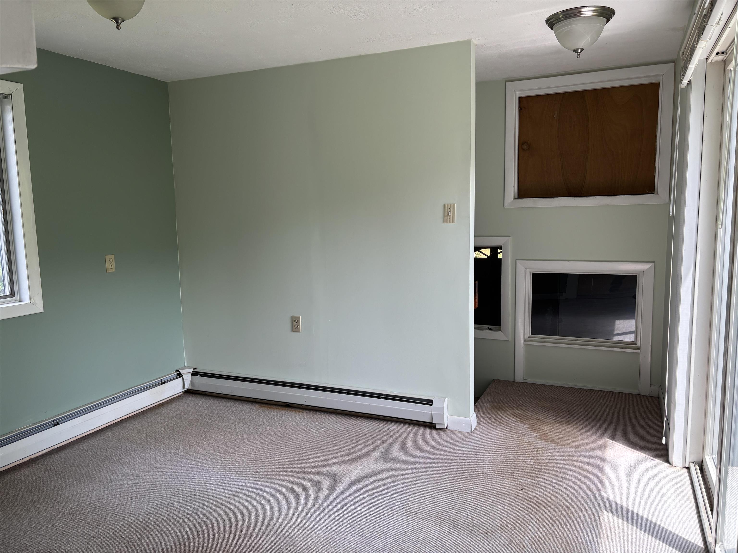 Located between Oversized garage and kitchen
