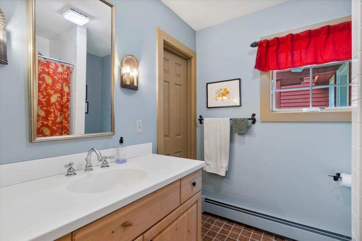 Main floor bath, has shower and walk in closet
